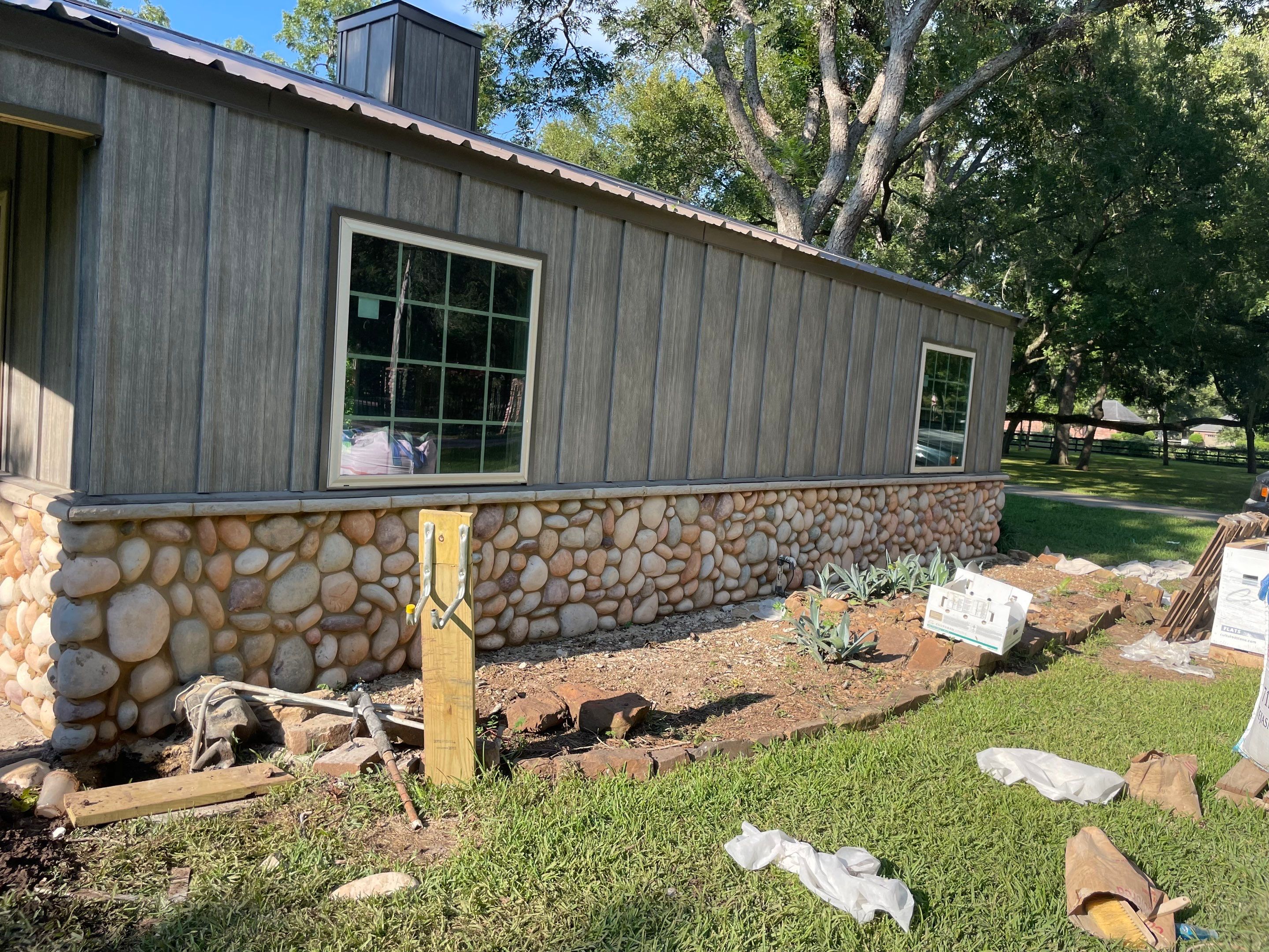 Richmond Addition: River Stone Detailing on a Hacienda Property by Apex Conventional Stucco Llc