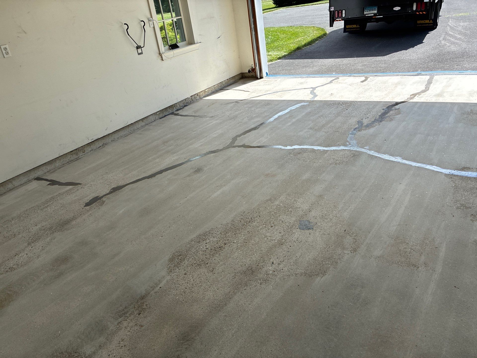 Basalt Concrete Floor Coating Transformation by DiGiorgi Roofing and Siding Inc