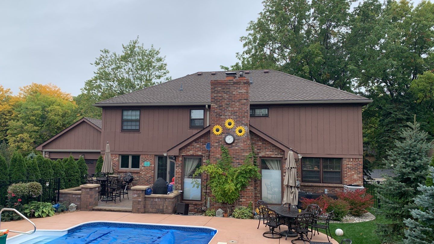 James Hardie Siding Replacement & Porch Addition by Bloomfield Construction & Restoration