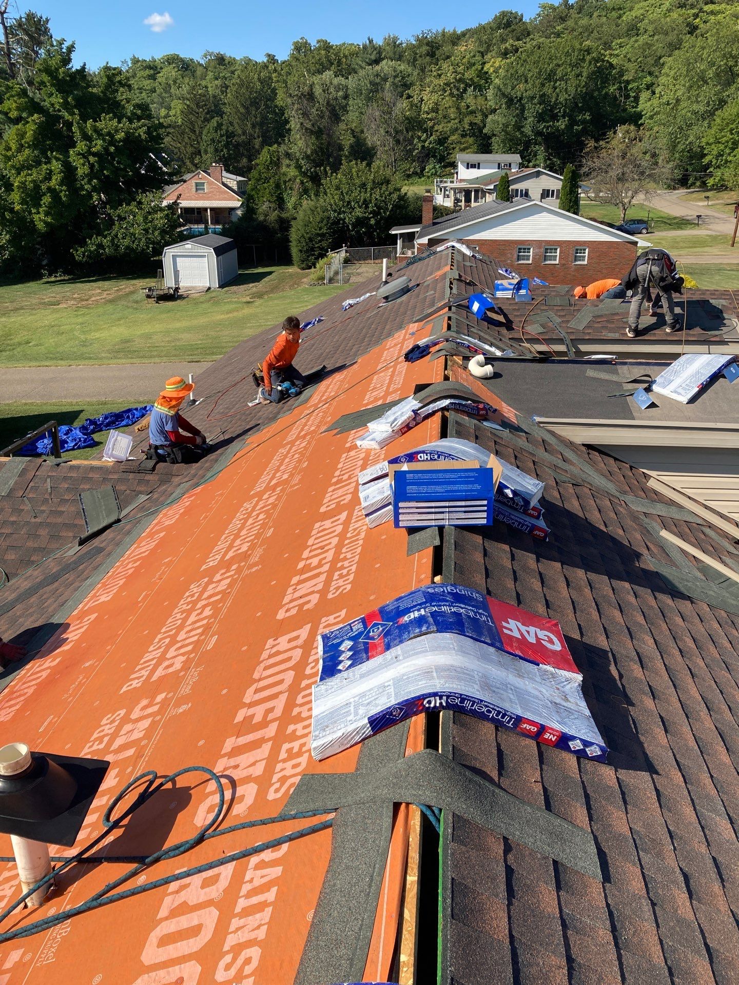 Residential Roofing Installation using GAF TImberline HDZ Hickory by Rainstoppers Roofing