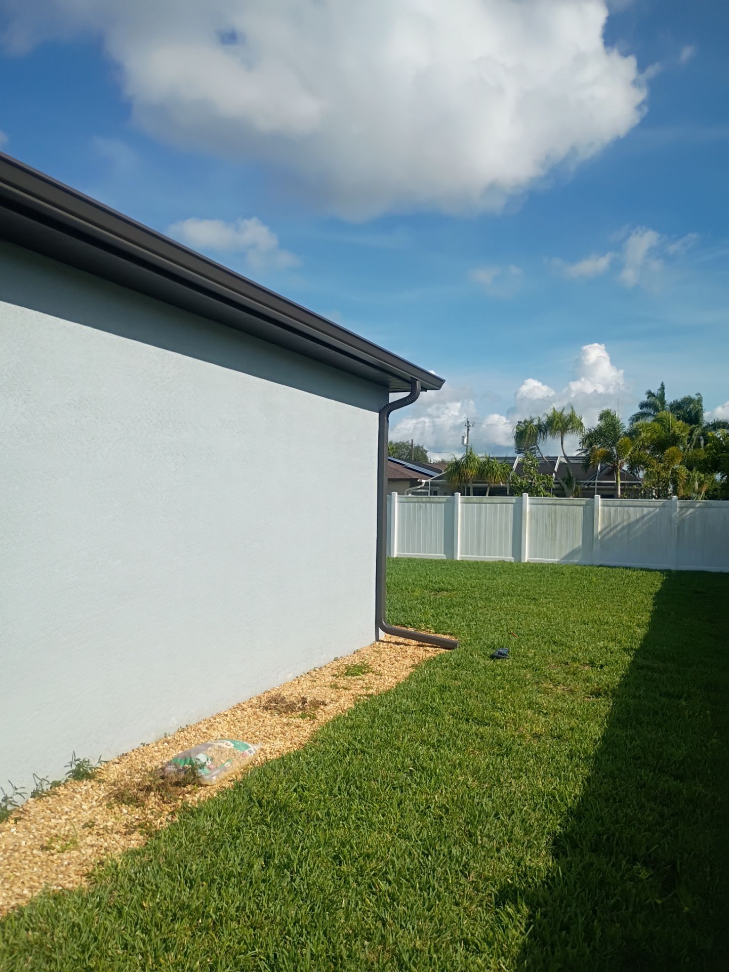 Dark Bronze Seamless Gutters using 6 Inch Seamless Gutters in Cape Coral FL by Gutter Professors
