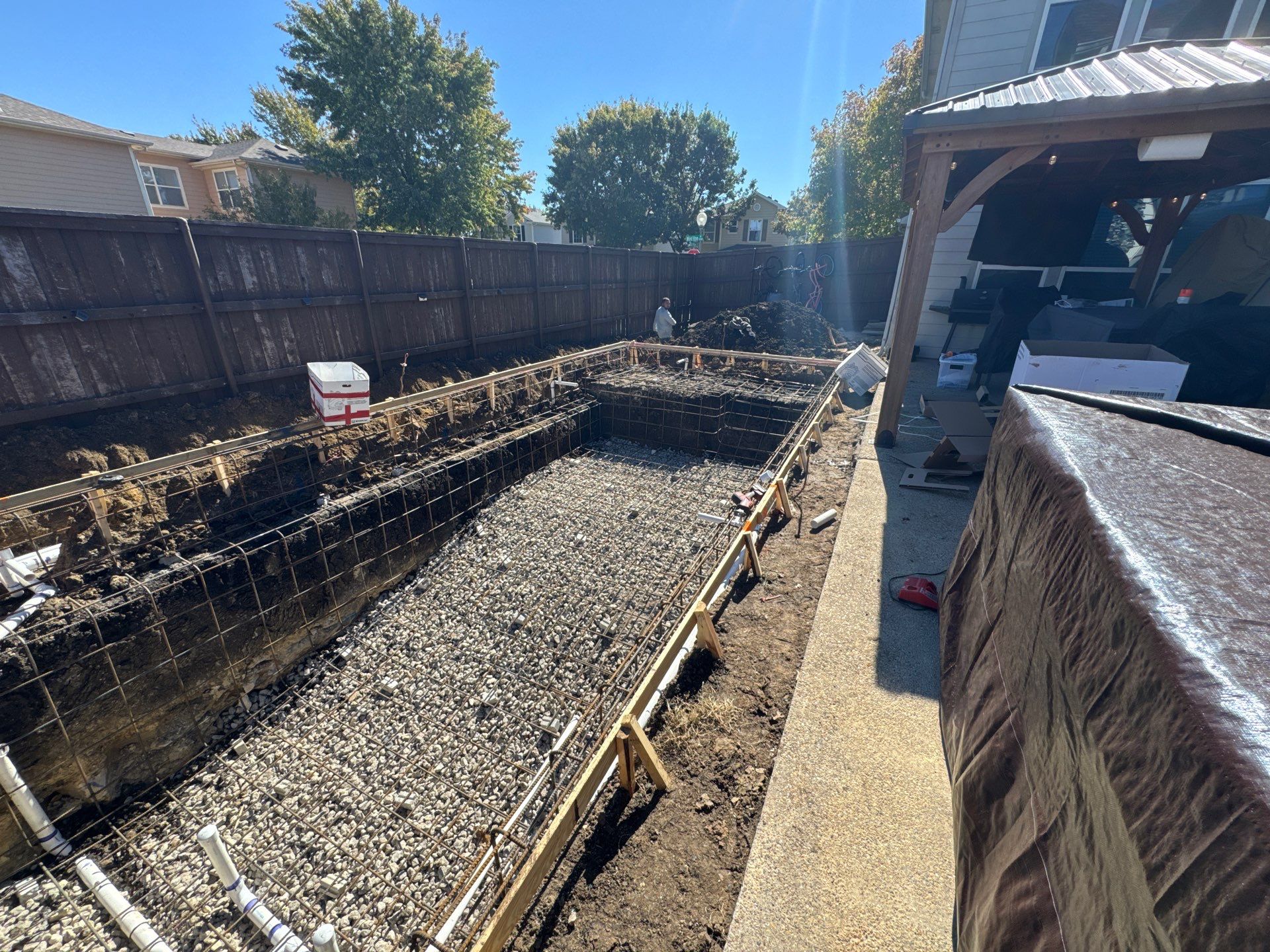 Pool with Turf and Raised Wall by Pinnacle Pools and Spas - DFW