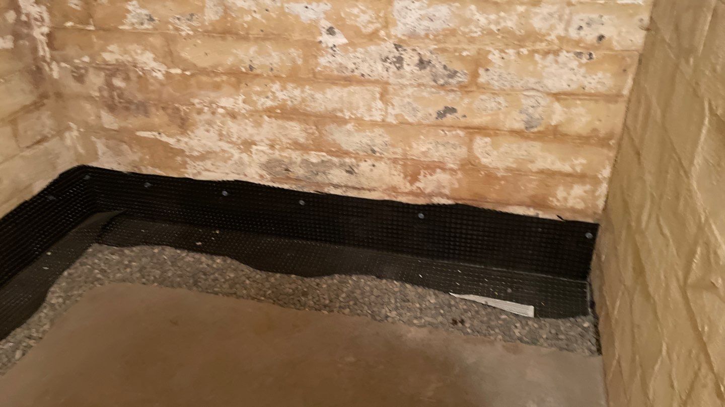 Interior Drain Tile for a South Minneapolis Basement by Waterproofing Northeast