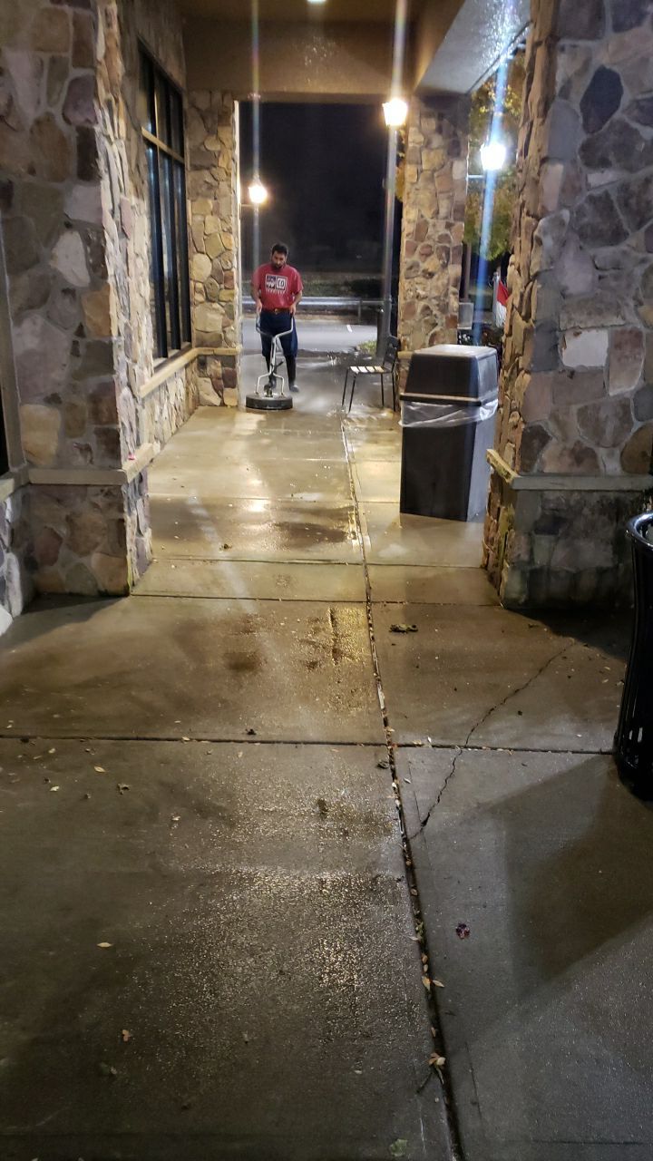contrete cleaning using cleaner by Power Wash Masters LLC