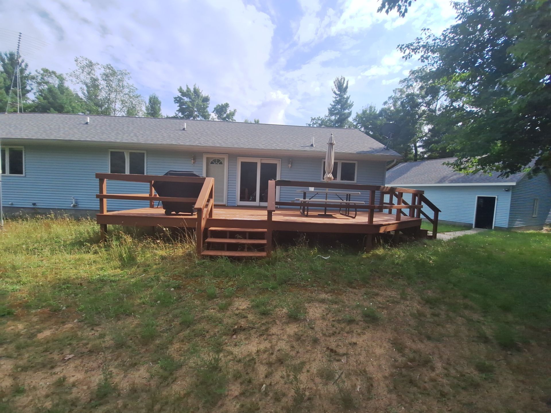Deck staining and exterior foundation painting! by Gordon Painting