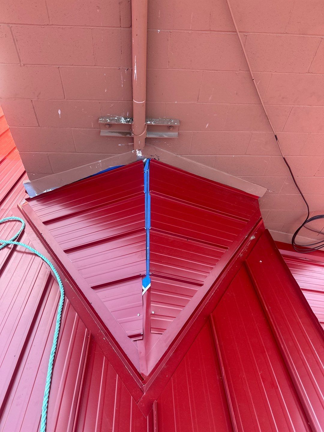 Commercial Roofing Installation using 12" Prolok metal  by Top Notch Roofing Inc