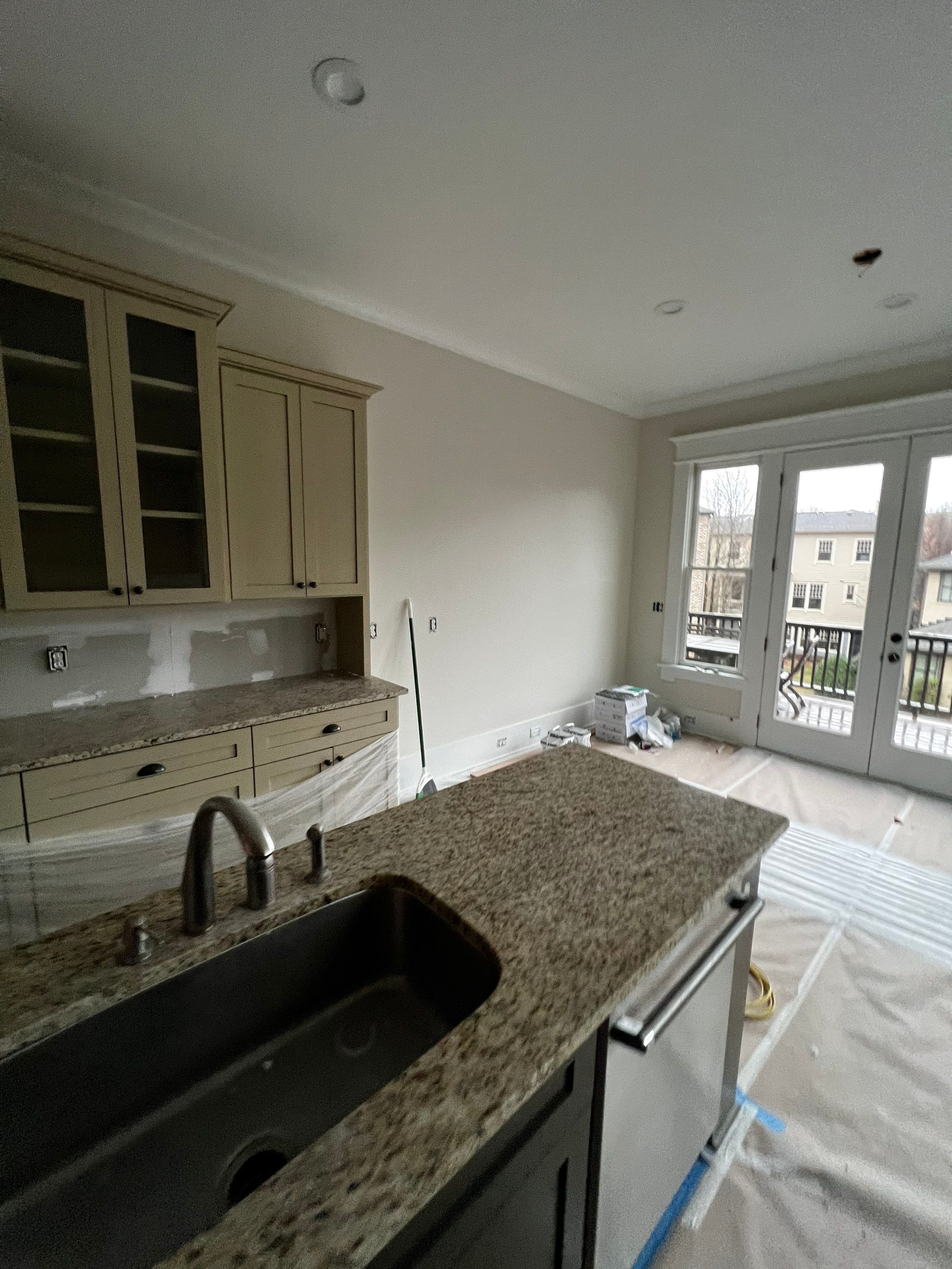 Atlanta Kitchen Renovation with Granite Countertops and Custom Island by Swift Home Renovations