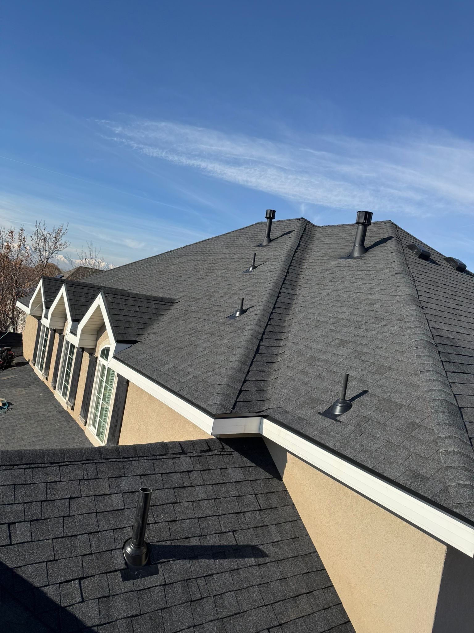 Charcoal Gray Shingles by Reimagine Roofing