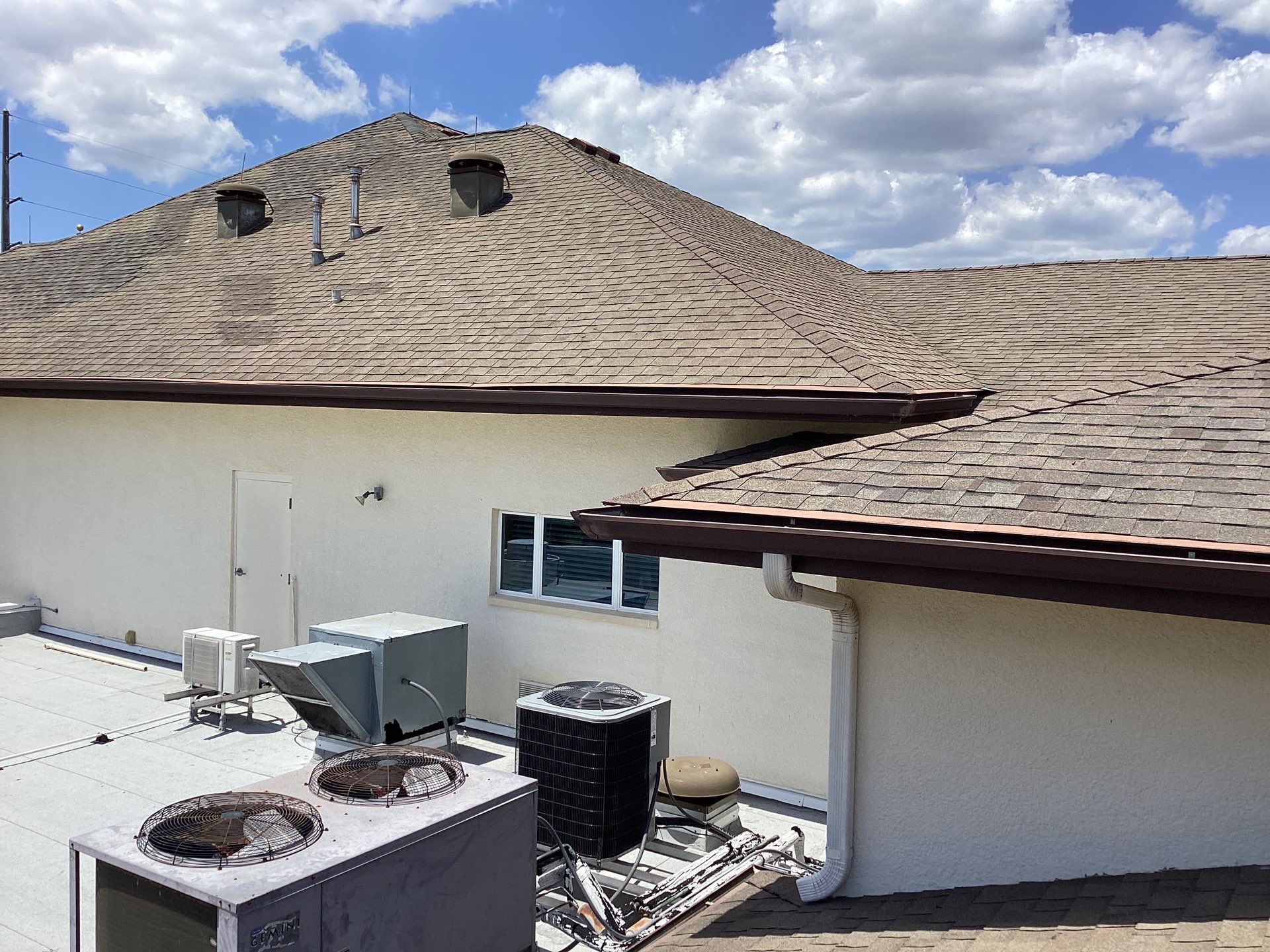 Musket Brown Seamless Gutters using Musket Brown Seamless Gutters in Capen Coral FL by Gutter Professors