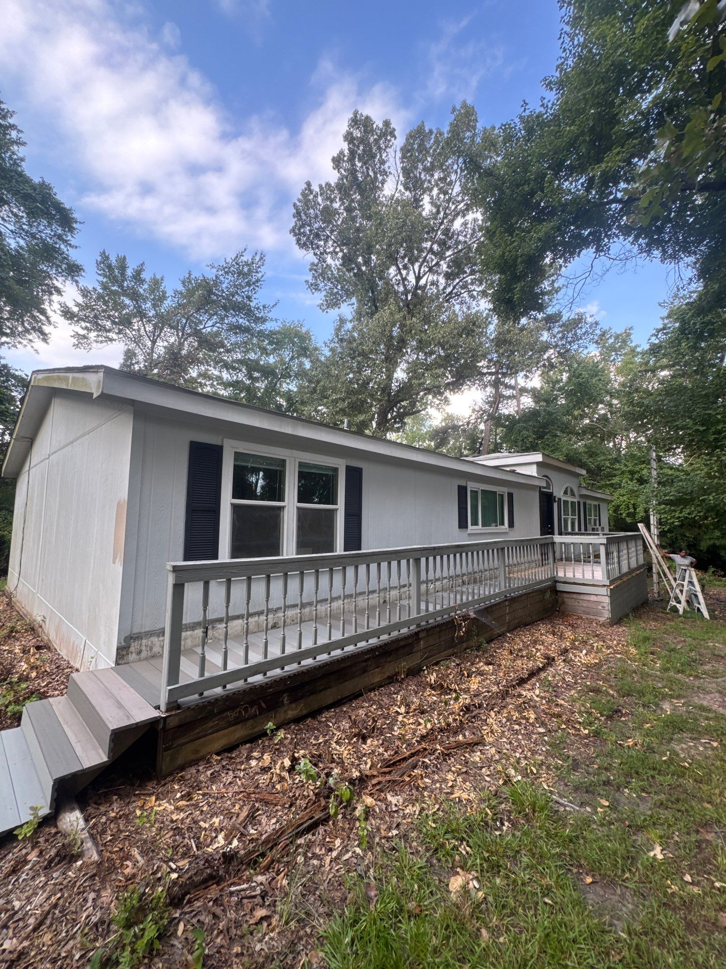 Exterior Painting in Tyler, TX | Black Back Porch, Wood & Shutters by Quality Coats Painting