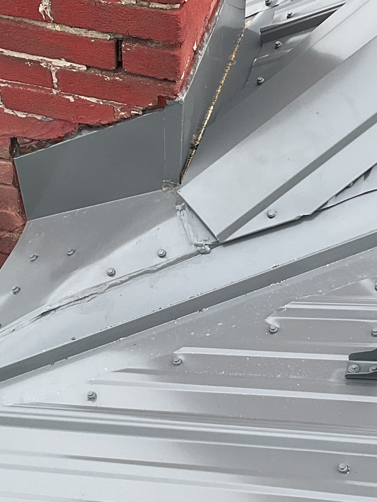 Charcoal Metal Roof & Blue Siding — A Refreshing New Look by Esh Builders