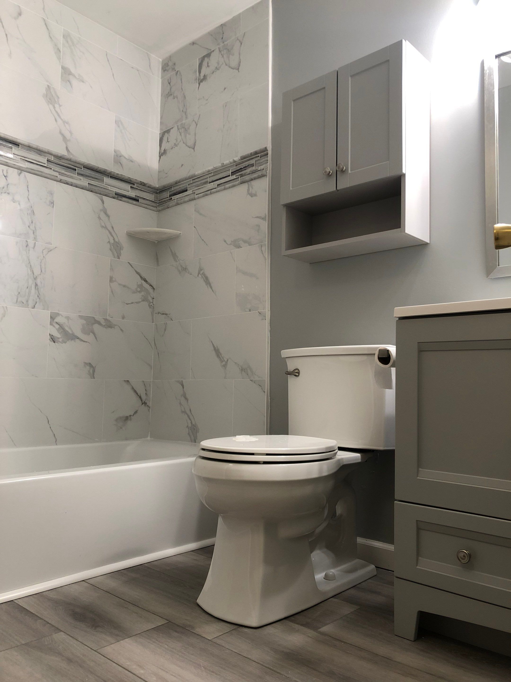 Bathroom Remodel using Tile by Home Concepts Construction