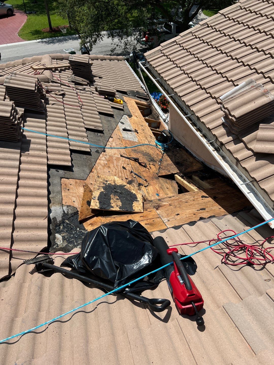 Concrete Tile Roof Leak Repair and Wood Decking Replacement in Parkland by Aastro Roofing