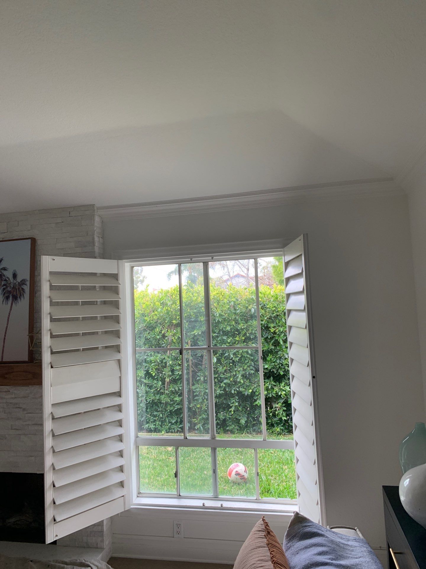 Window Installation using Milgard black vinyl windows by American Window Company