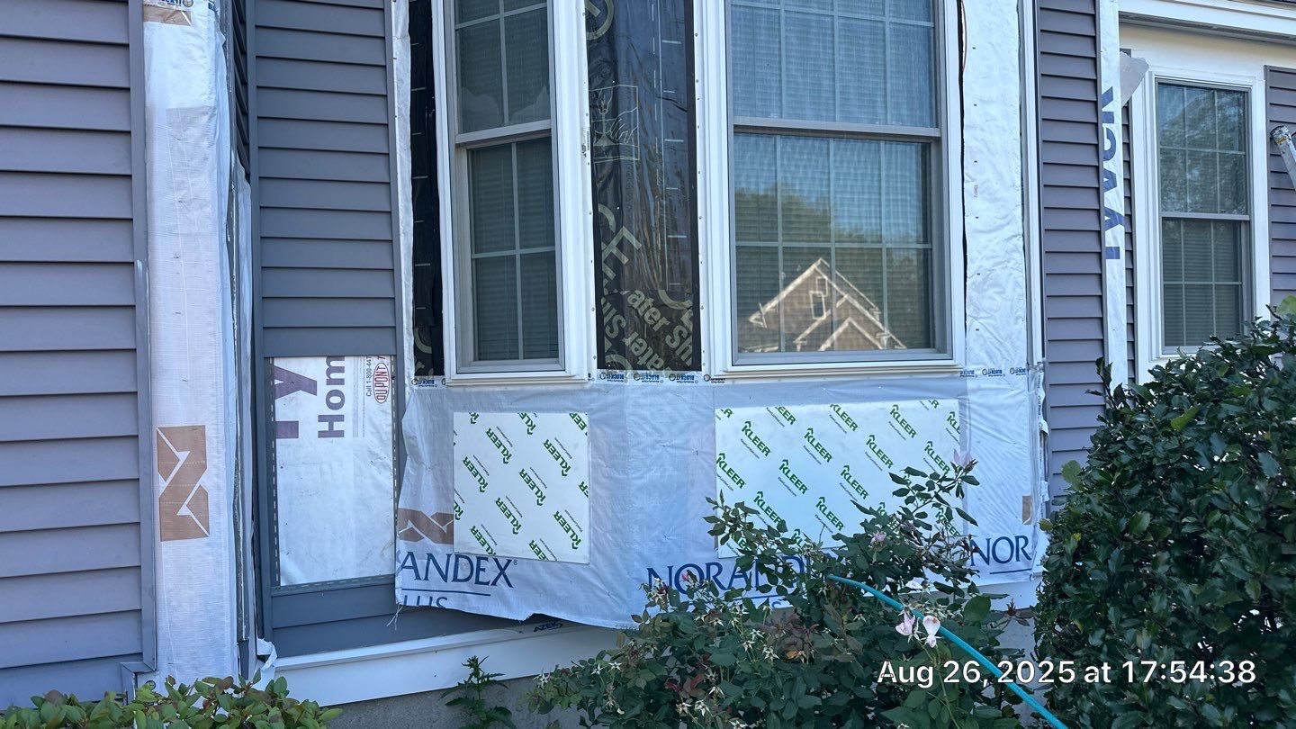 Roof, Trim, Deck, and Gutter Restoration by Mighty Dog Roofing of Greater Middlesex County