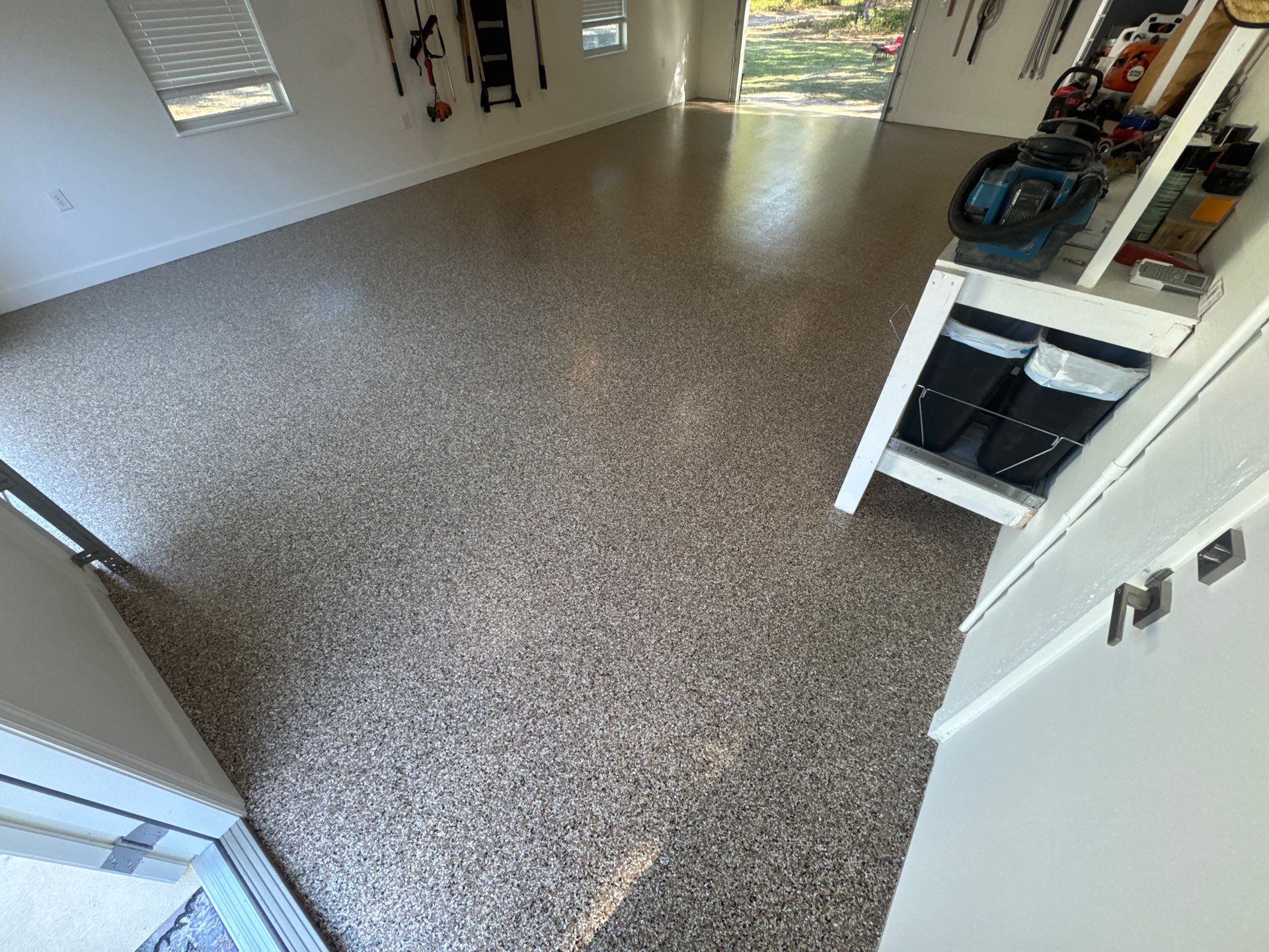 Garage in Hawthorne, FL in Sandstone by Cross Creek Concrete Coatings