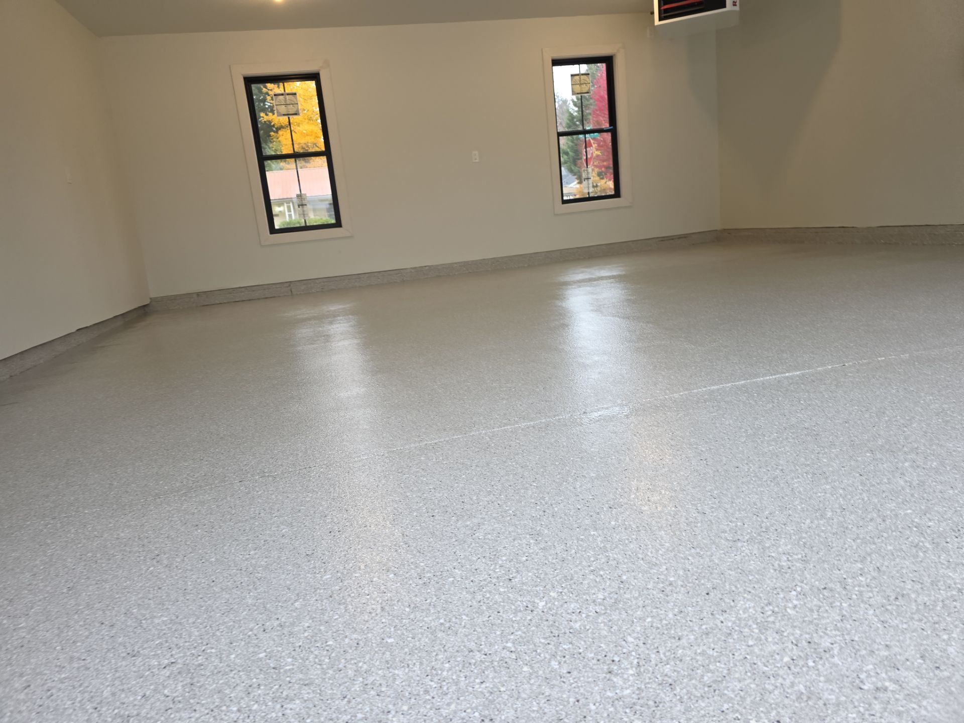 Garage Transformation using Limestone Hybrid by Croc Coatings, LLC