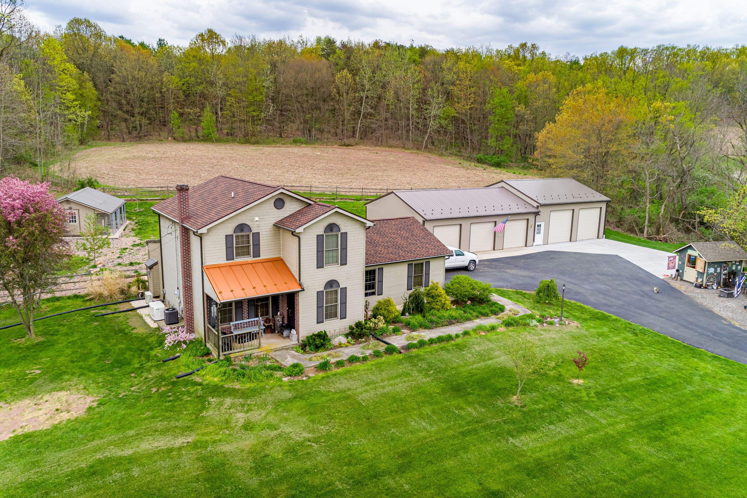 Shingle Roof-hickory, Metal Roof-bronze, Garage addition by Esh Builders