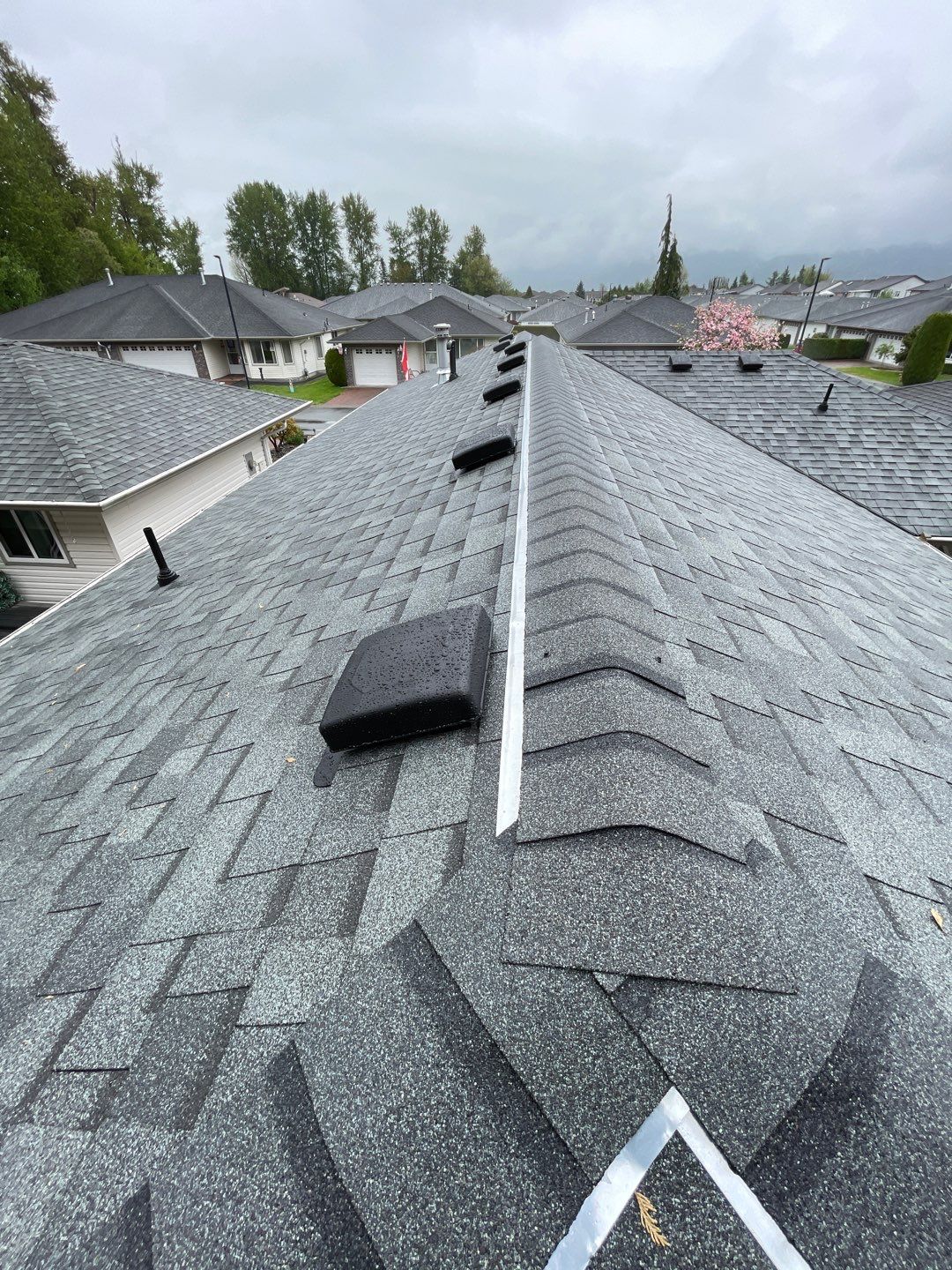 Residential ReRoofing Installation using OC Estate Gray Shingles by Top Notch Roofing Inc