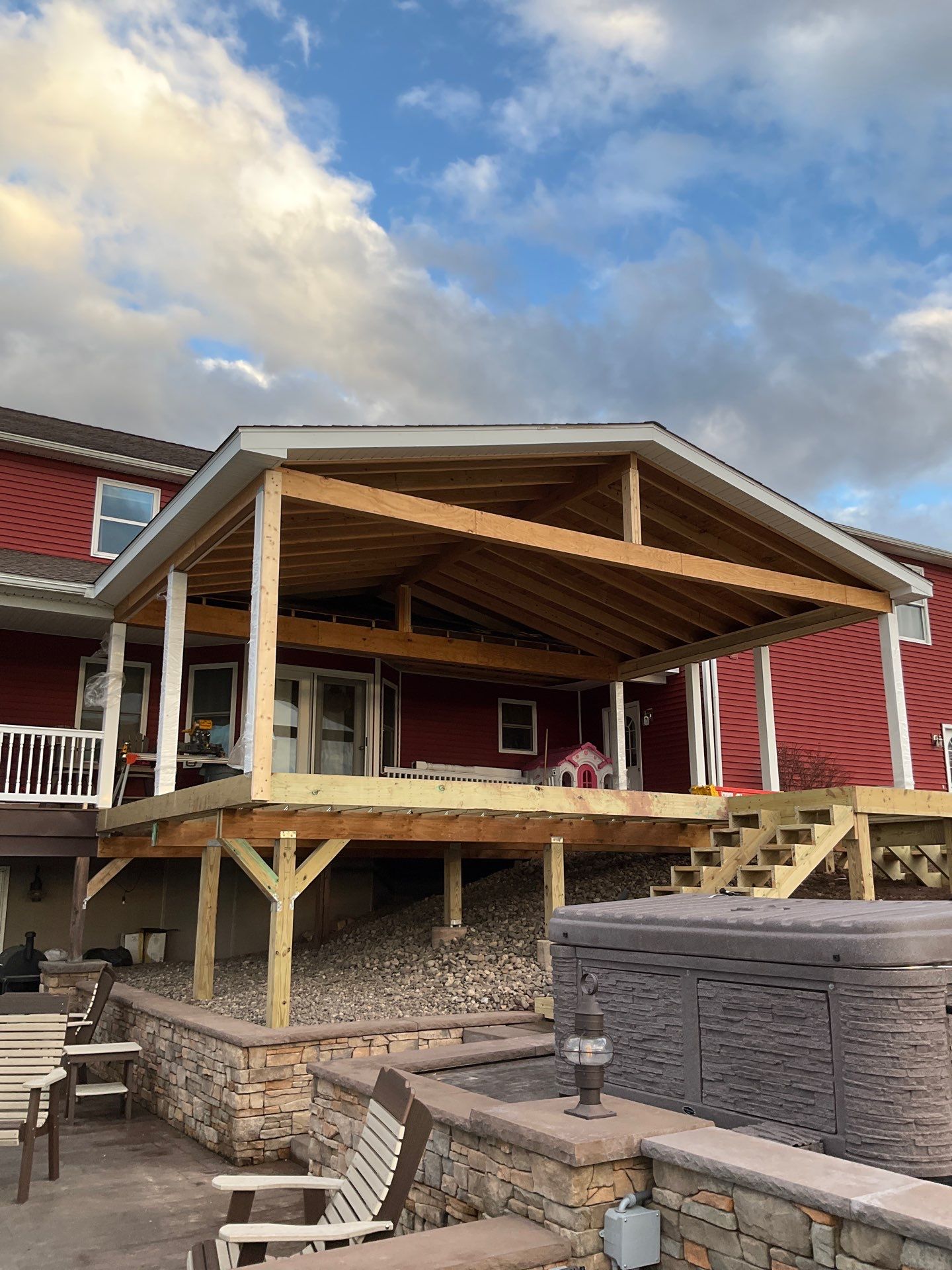 Covered Deck Addition With Custom Gable Roof in Tower City by Esh Builders