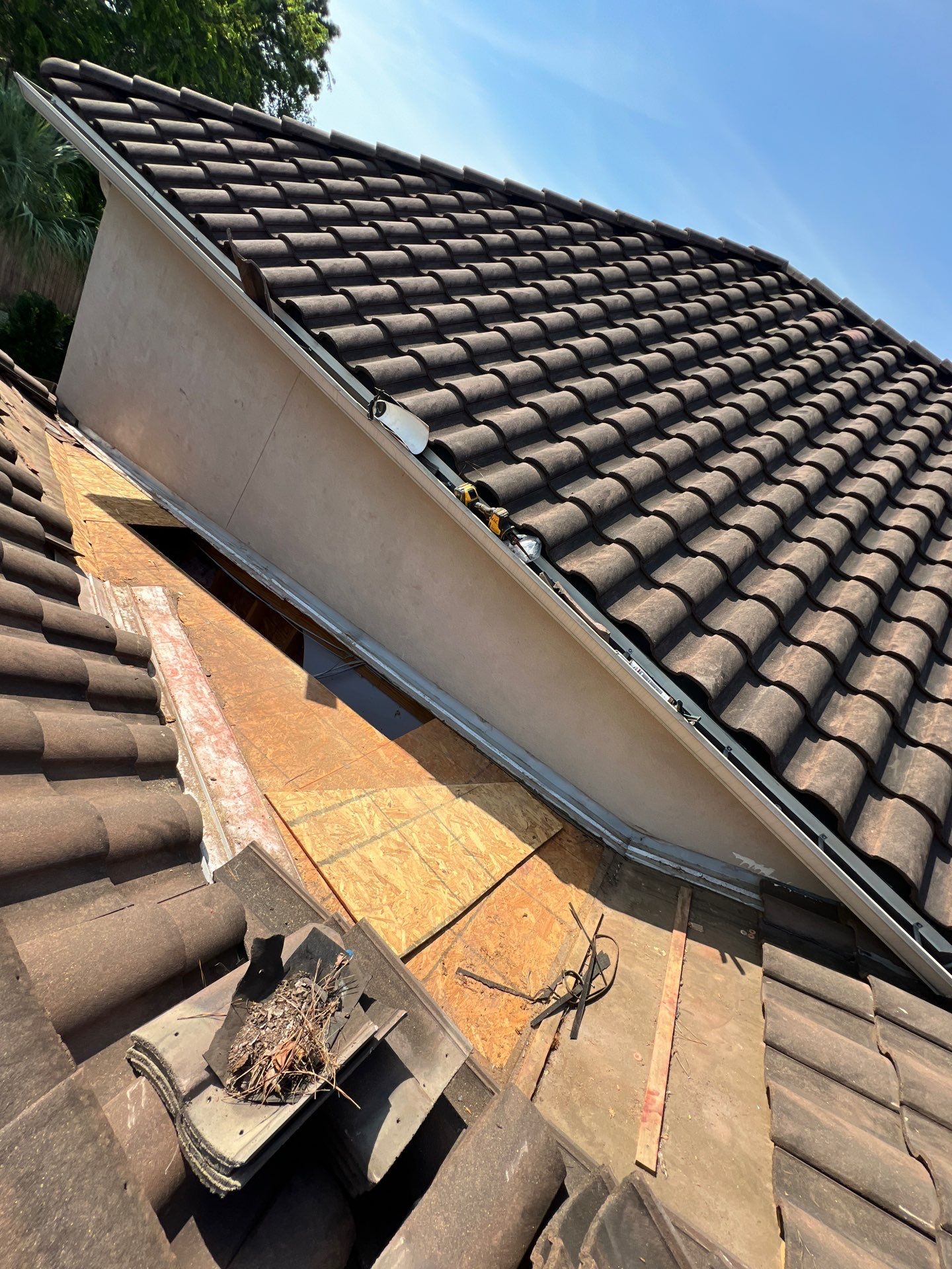 Residential Roofing Repair using tile by Roof Repair Company