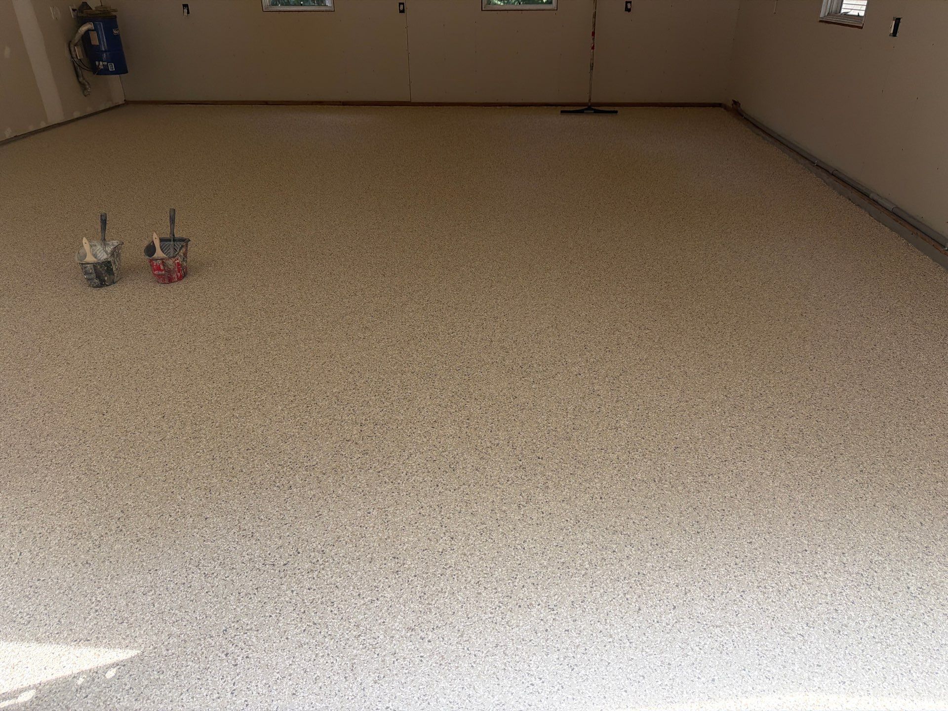 Garage Epoxy Floor Coating with Speckled Flake Finish in Fruitport by Gordon Painting