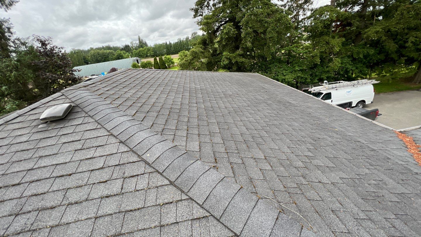 Residential Roofing Installation using 12" Prolok metal  by Top Notch Roofing Inc