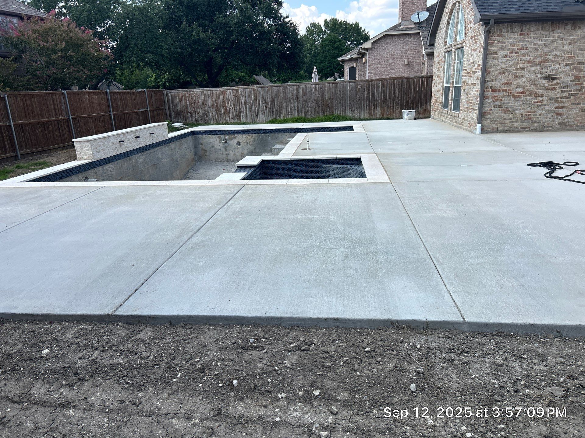 Geometric Pool with Inset Spa and Dark Interior by Pinnacle Pools and Spas - DFW