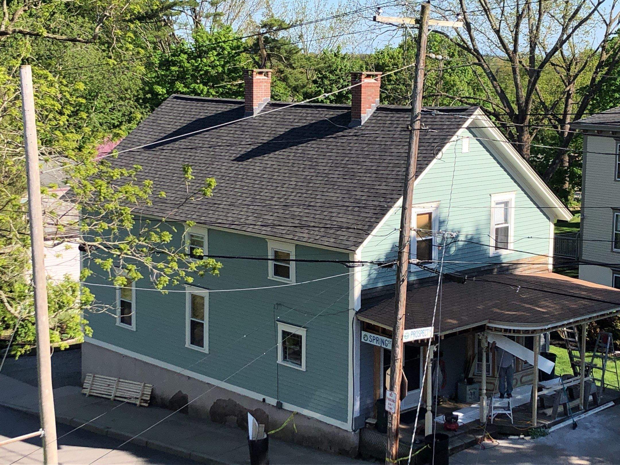 Pewterwood Roofs by Pinnacle Roofing & Skylights