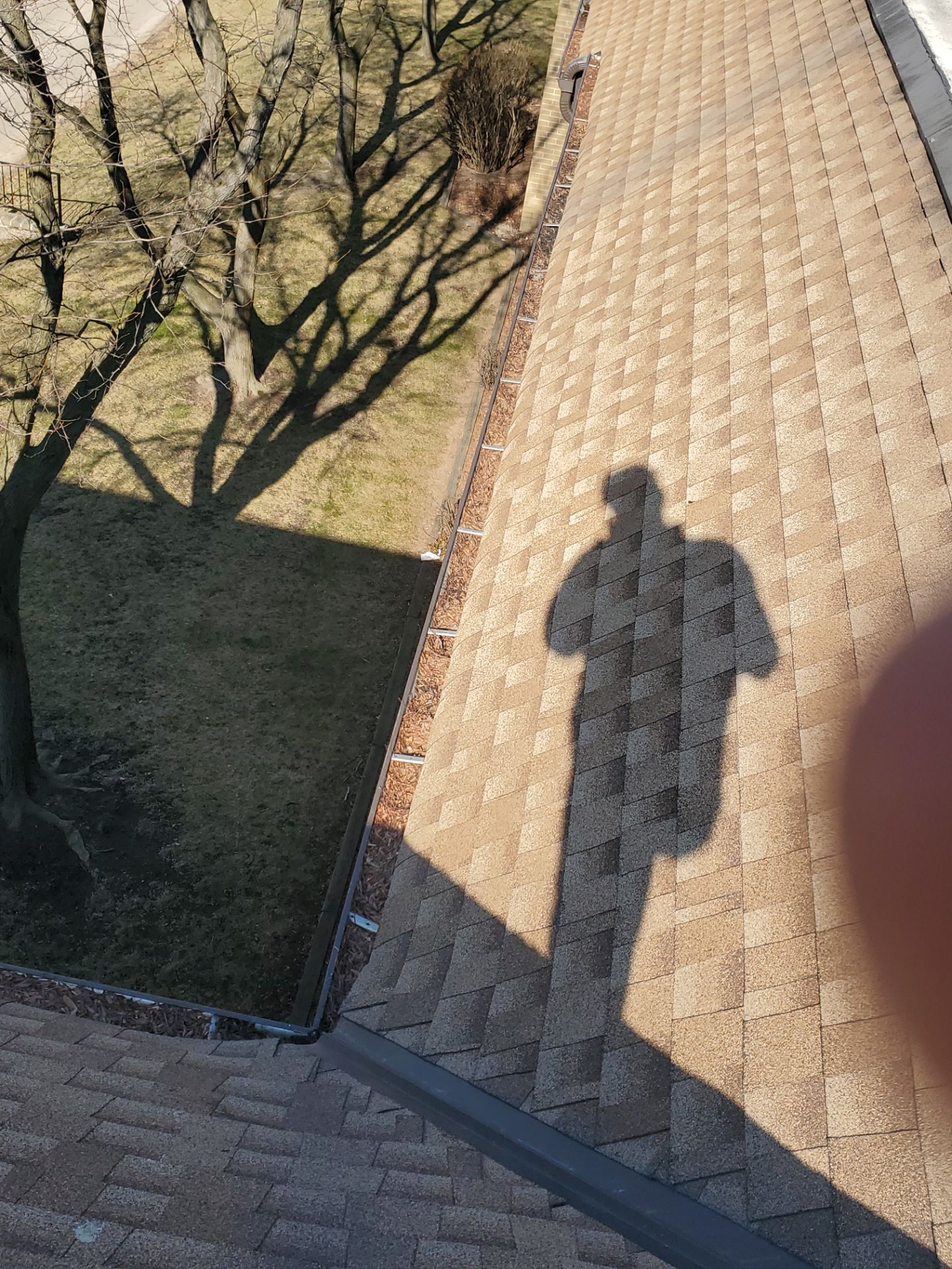 Commercial gutter cleaning Milwaukee before photo with filled gutters