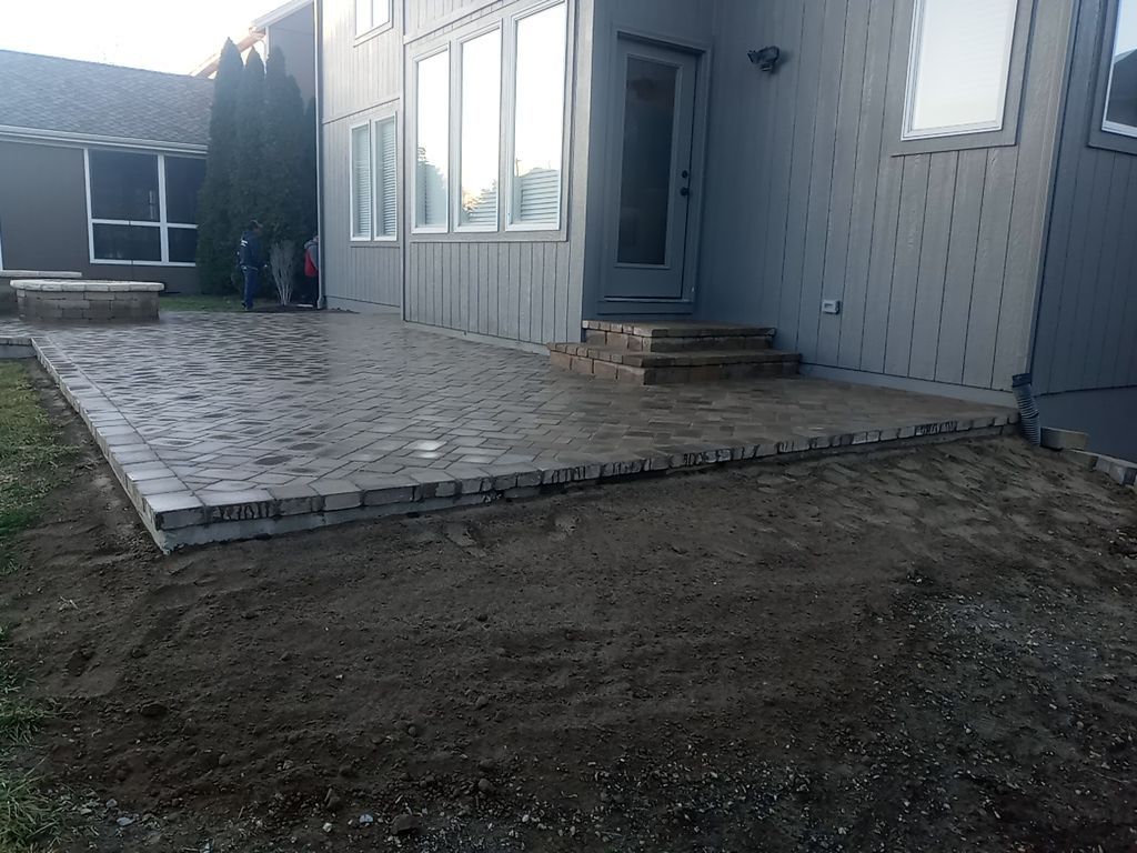 Back Yard Paver Patio by LAND ESCAPES LLC