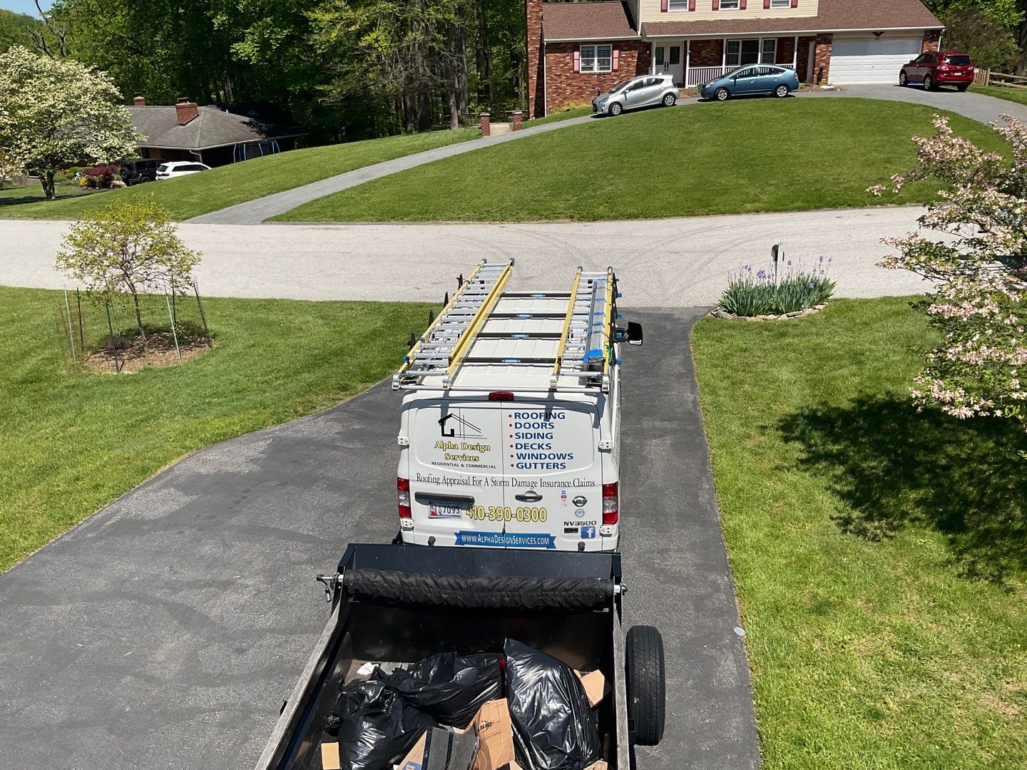 Residential Roofing Installation using Landmark Shingles Color Weatherwood by Alpha Design Services