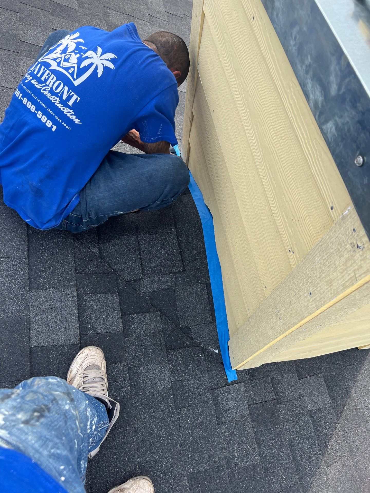 Nothing looks nicer than a little black roof by Bayfront Roofing and Construction