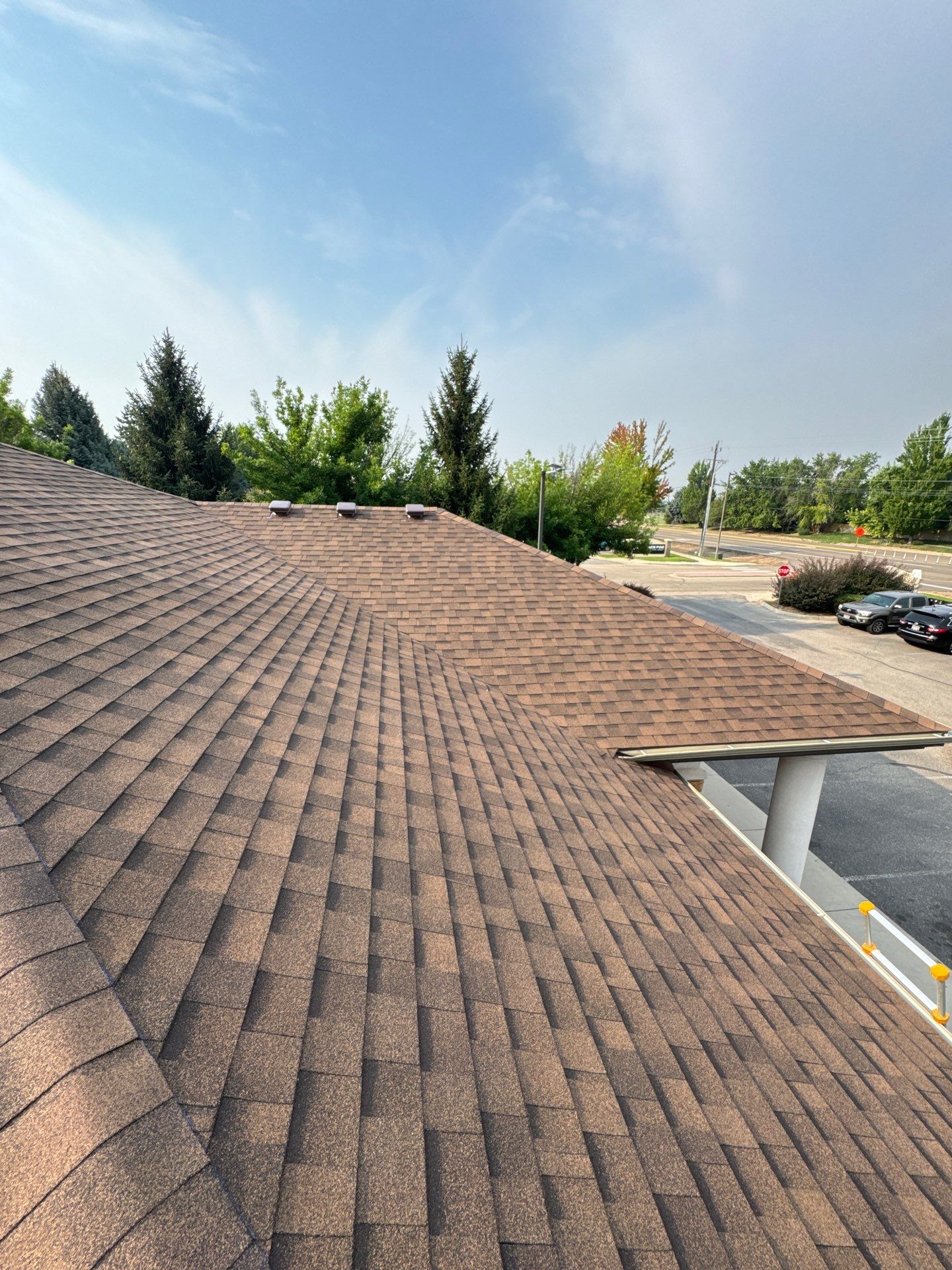 Boise Commercial Roof Replacement with Brown Architectural Shingles by Olive Roofing