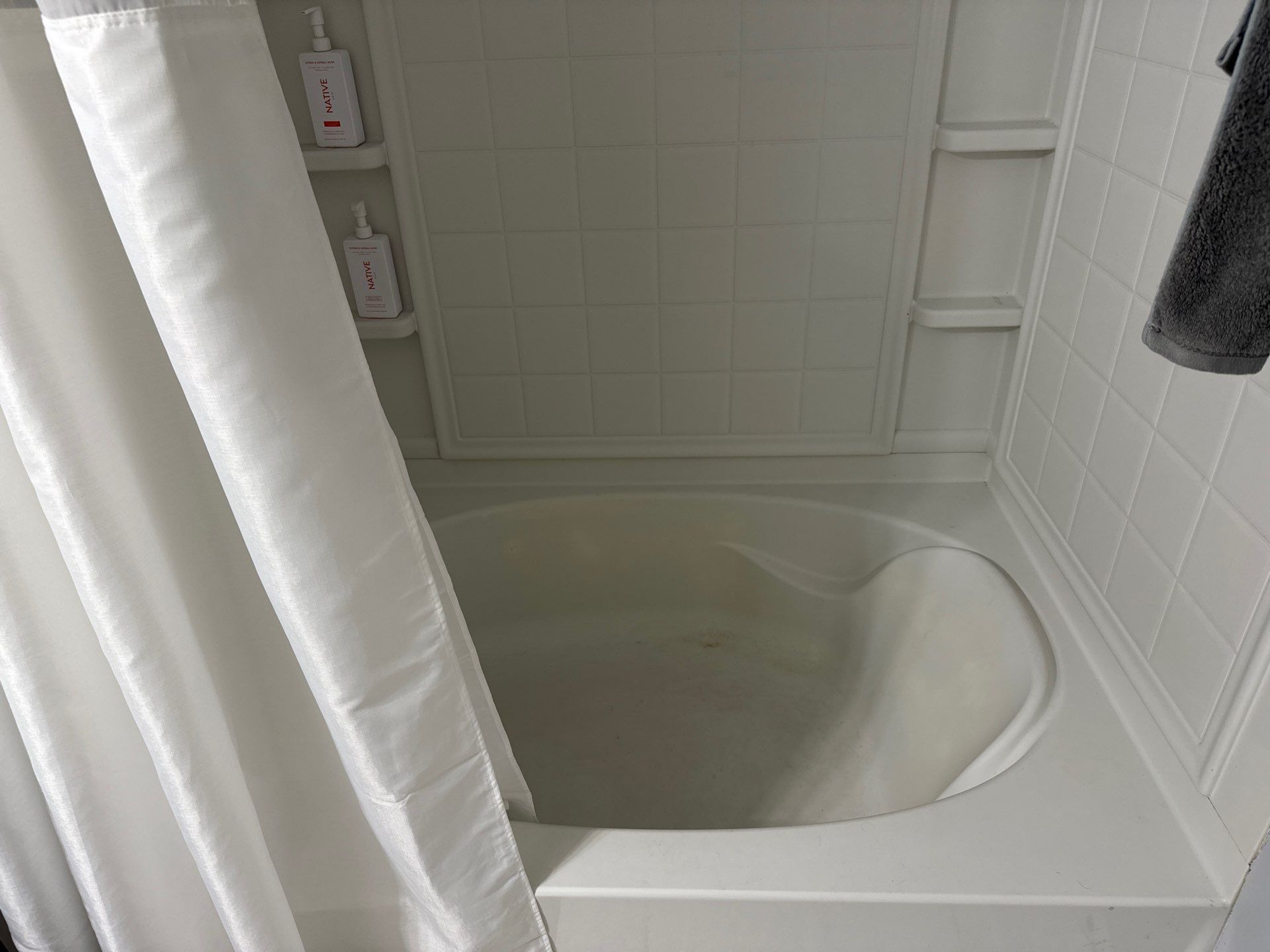 Tub to walk-in shower conversion, and tile flooring by Prudencio