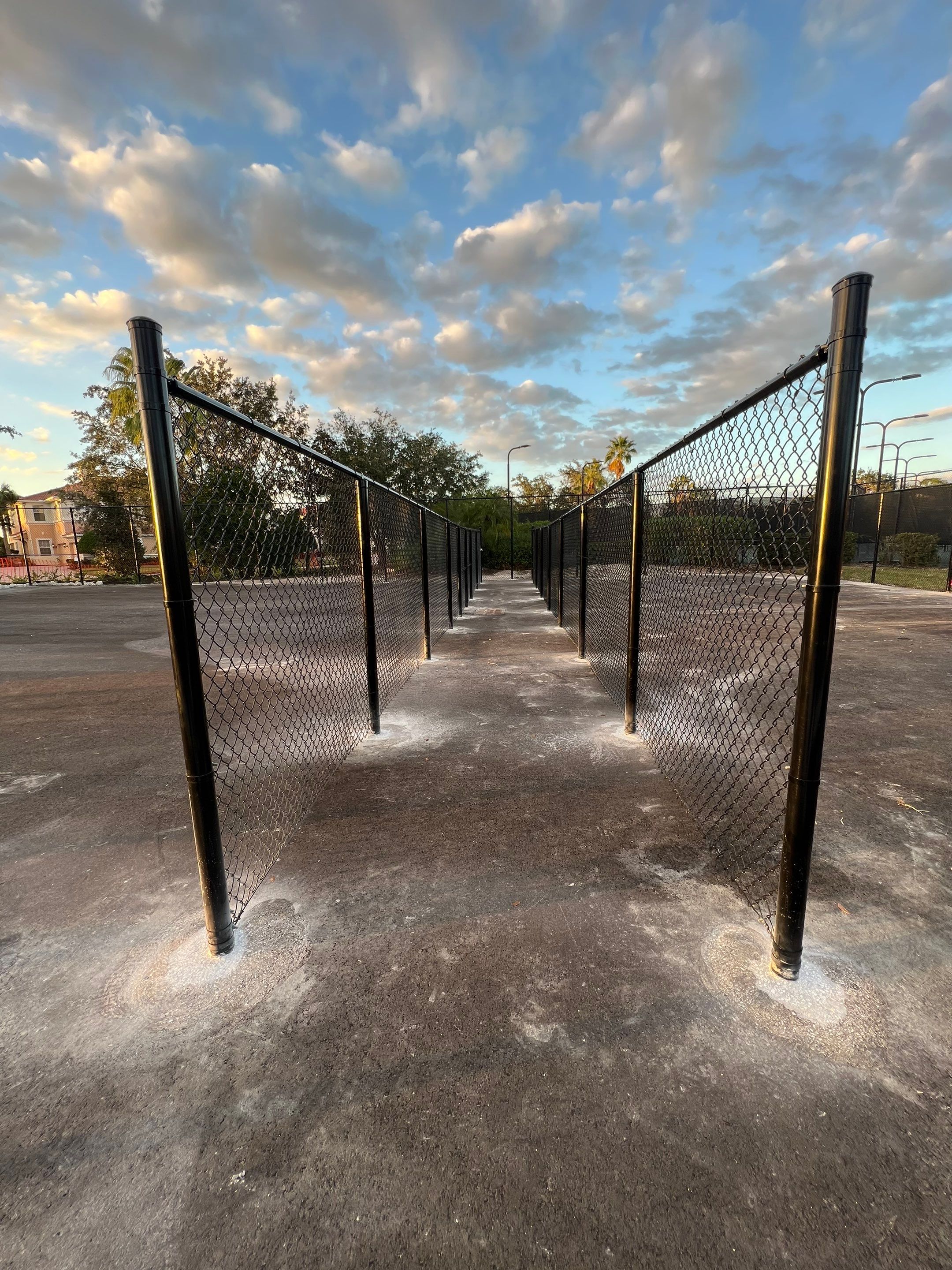 Chain-link Fence Installation using 8Ft Tall Black Chainlink Fence by Asap fence and gates, LLC