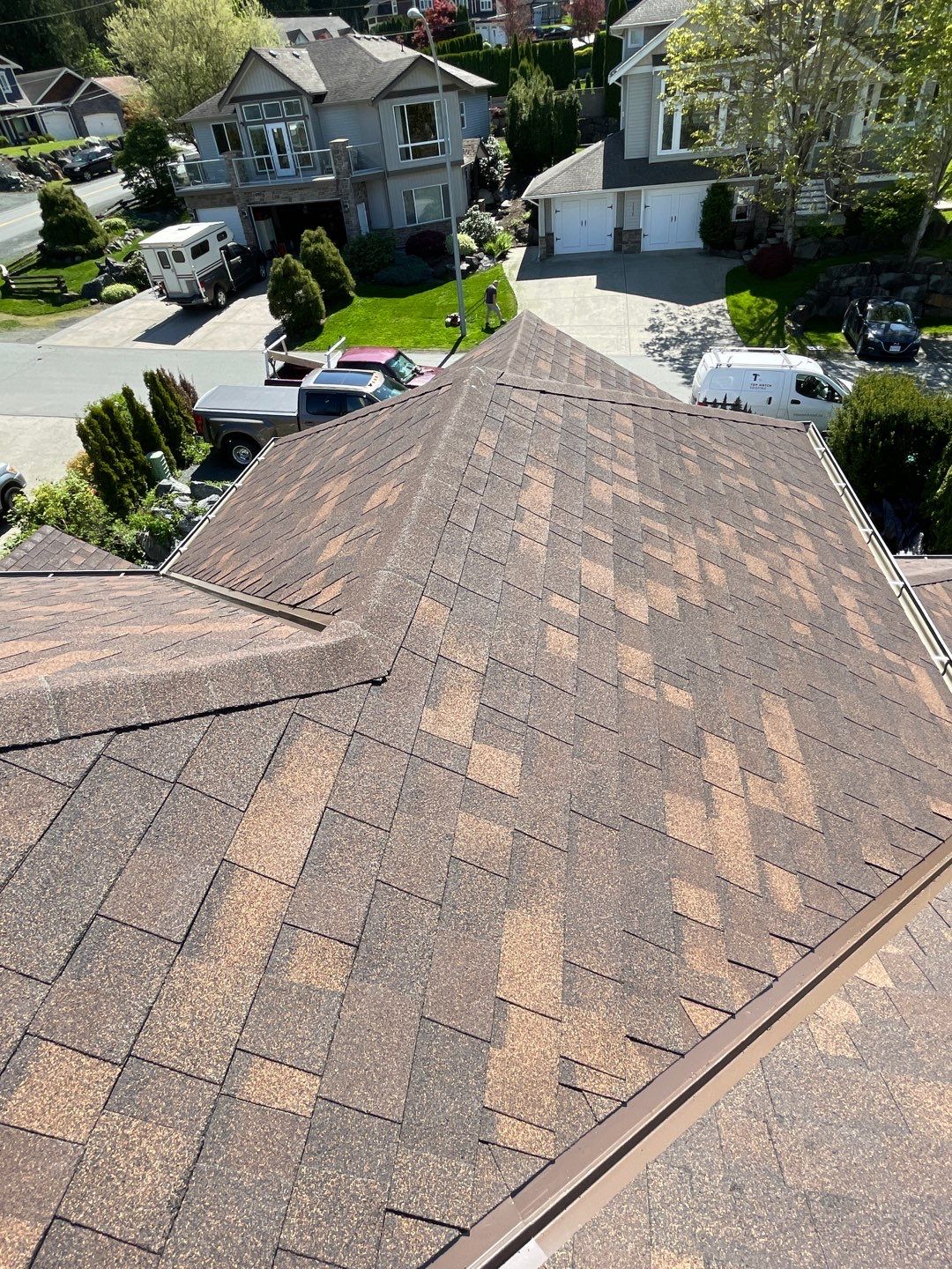 Residential Roofing Installation using OC Oakridge shingles by Top Notch Roofing Inc