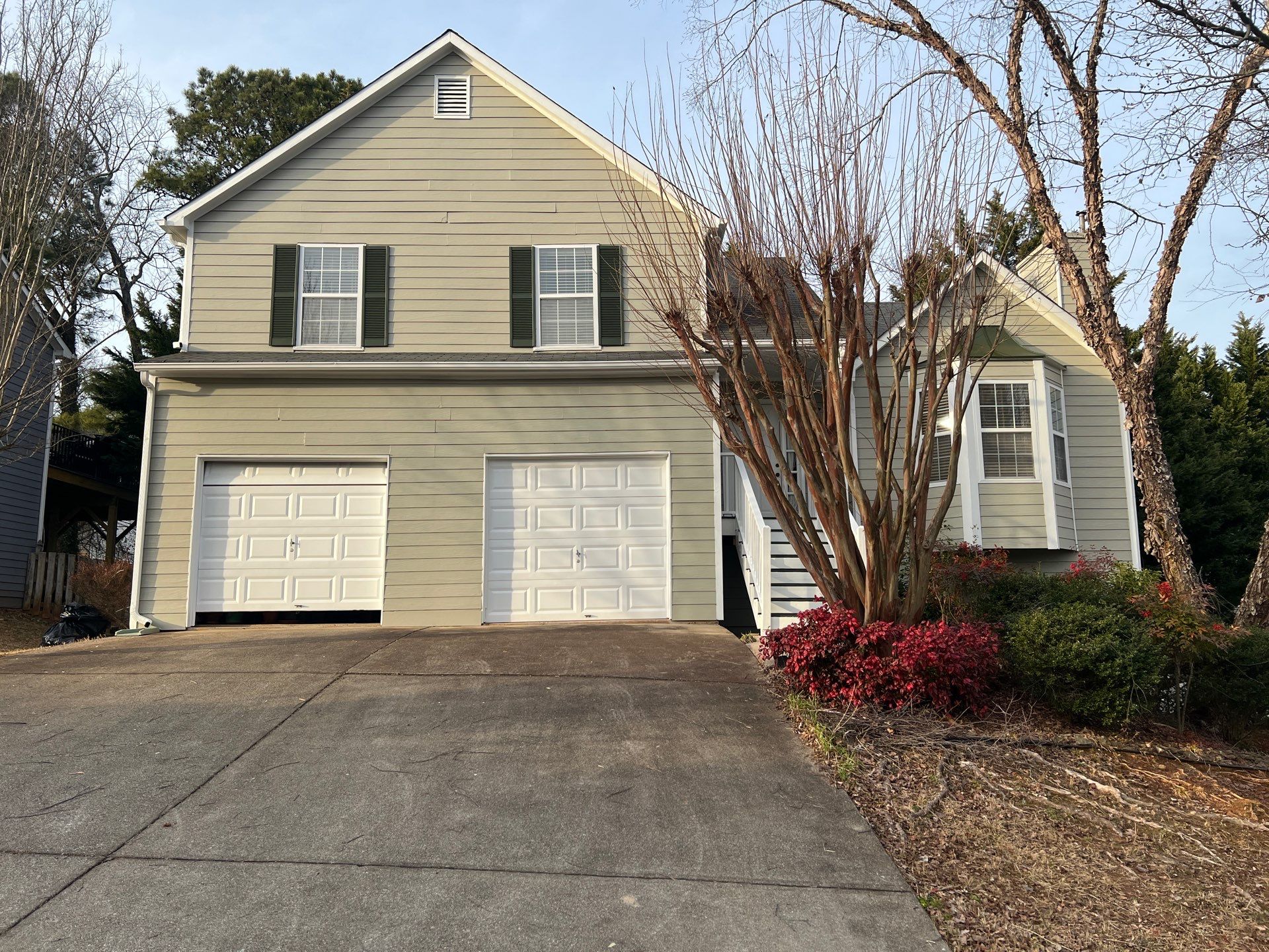 Exterior Residential Painting and Deck Staining in Kennesaw, Georgia by Swift Home Renovations