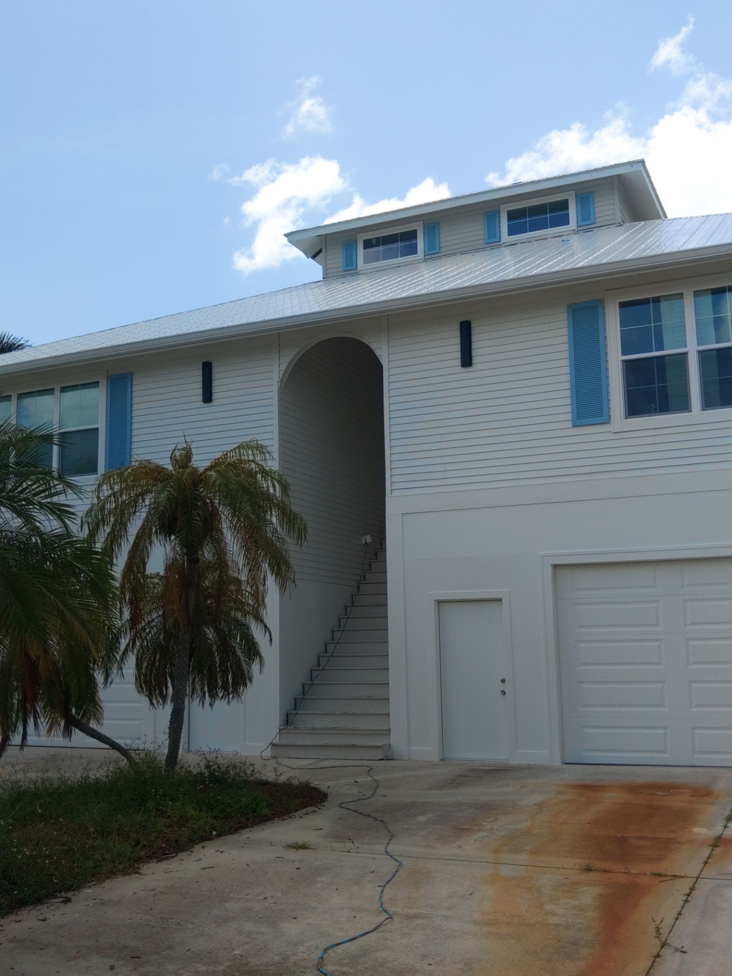 Complete Gutter System with Downspouts & Guards in Fort Myers Beach FL by Gutter Professors