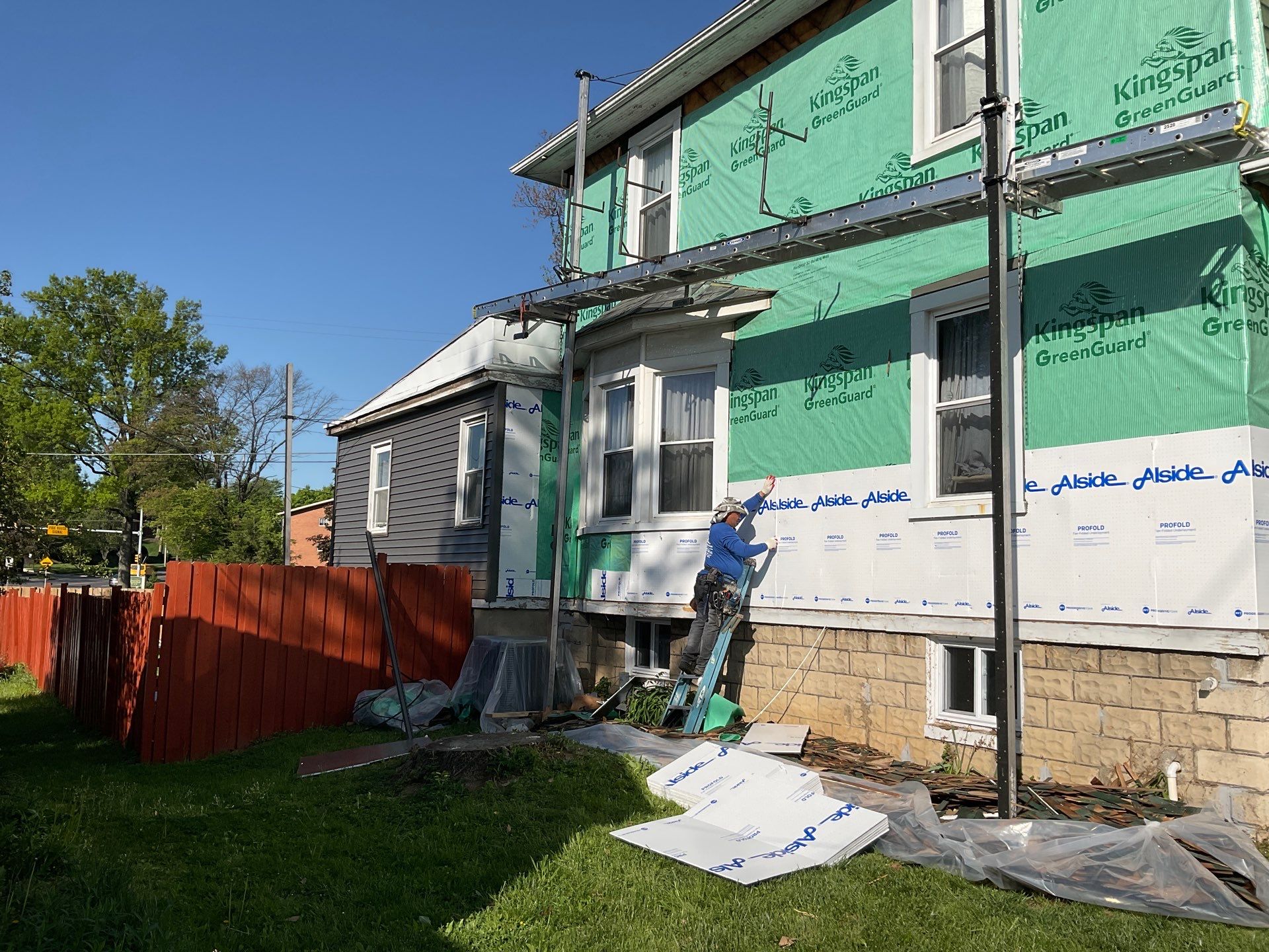 New siding & New Gutters by Alpha Design Services
