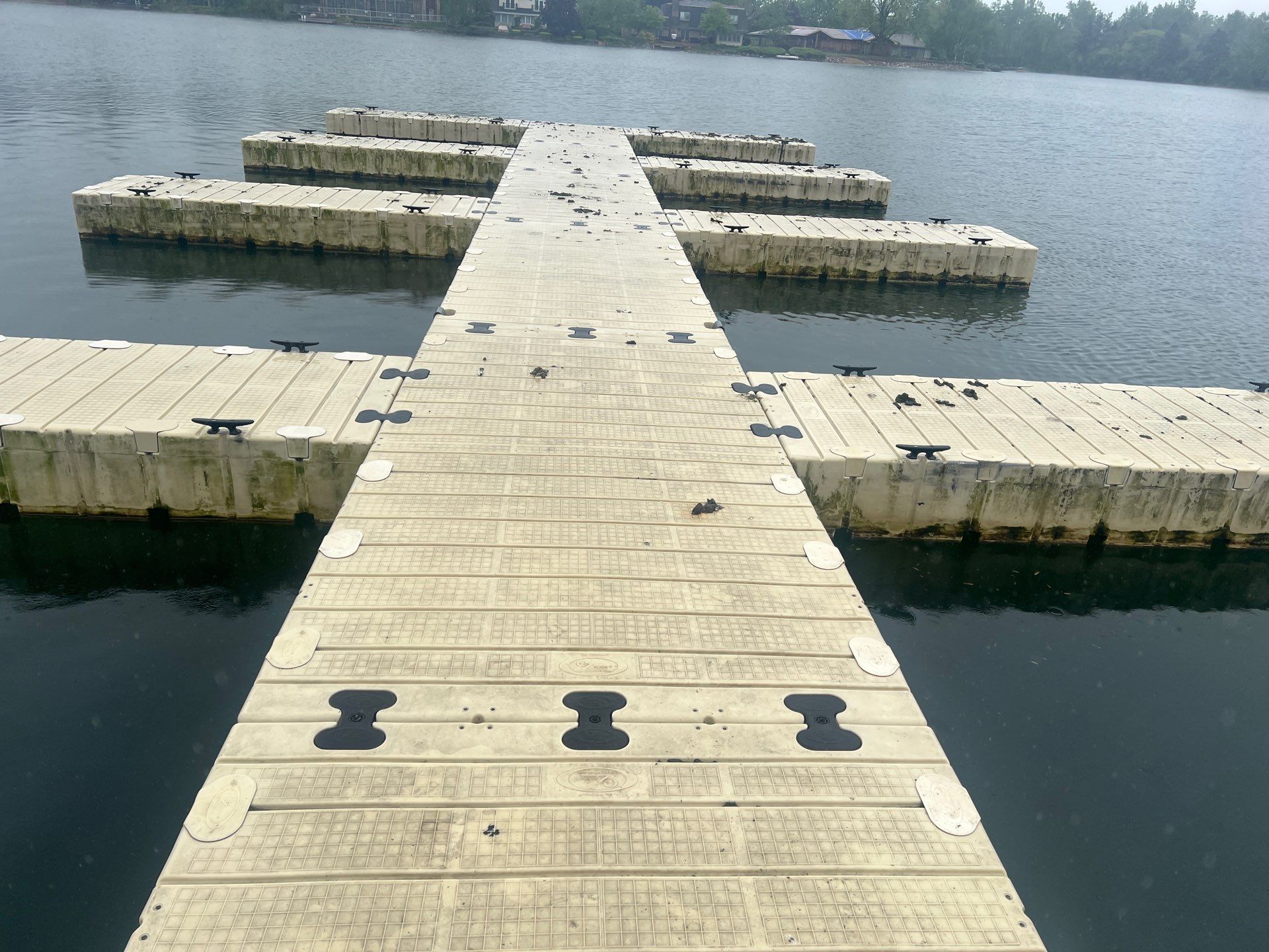 Power washing of floating dock by Northern Power Washing LLC.