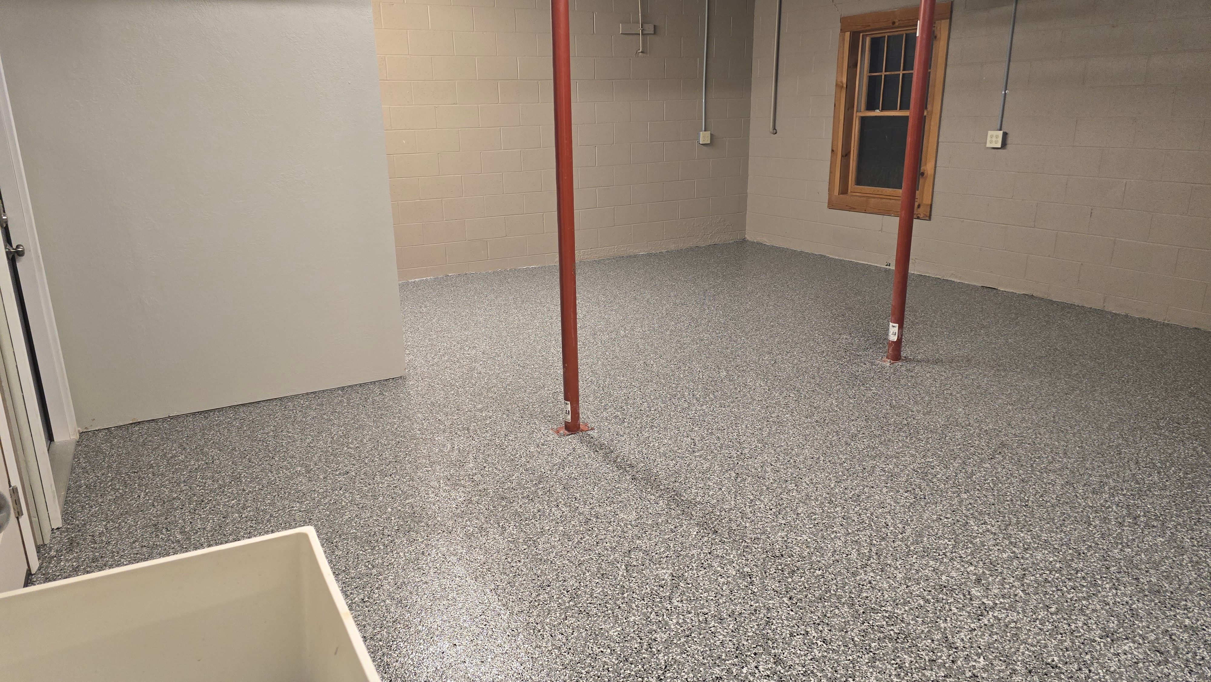 Garages, Basement & Patio Using Wombat & Obsidian by Elite Floor Solutions