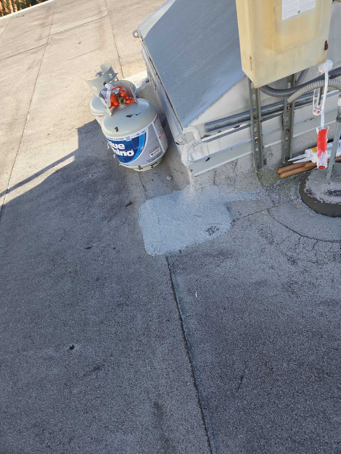 Commercial Flat Roof Restoration Using Silicone Coating in Hallandale Beach by Aastro Roofing