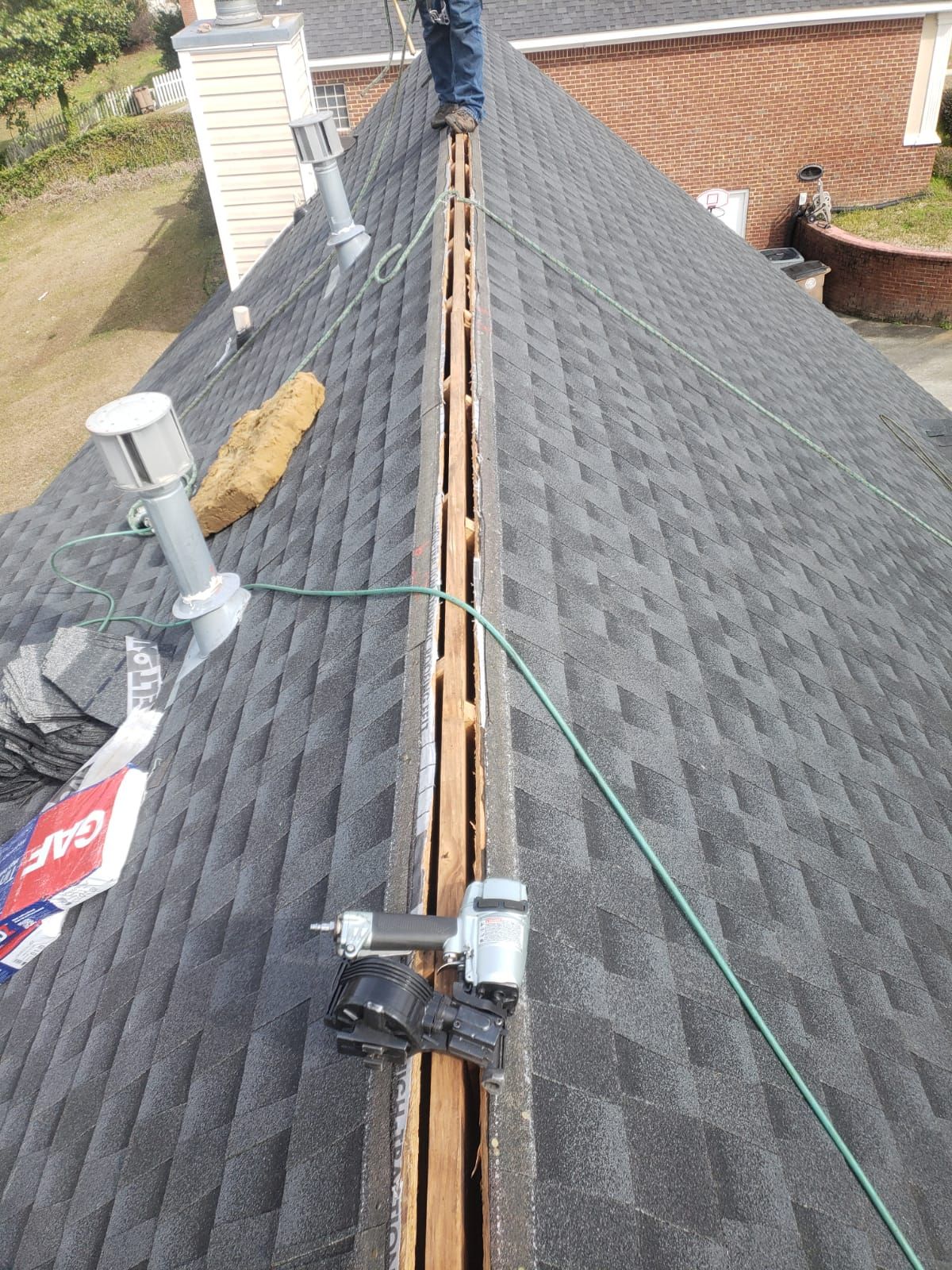 Residential Roofing Installation using Roof Replacement by American Roofing & Construction LLC