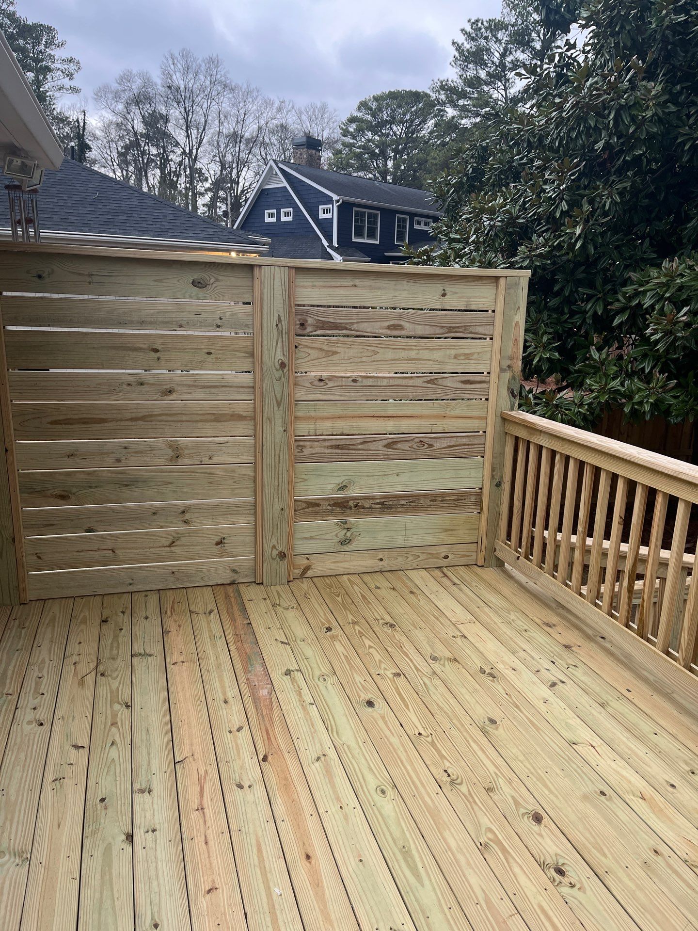 Wood Deck Resurface with Privacy Wall in Buckhead, GA by Nelson Exteriors