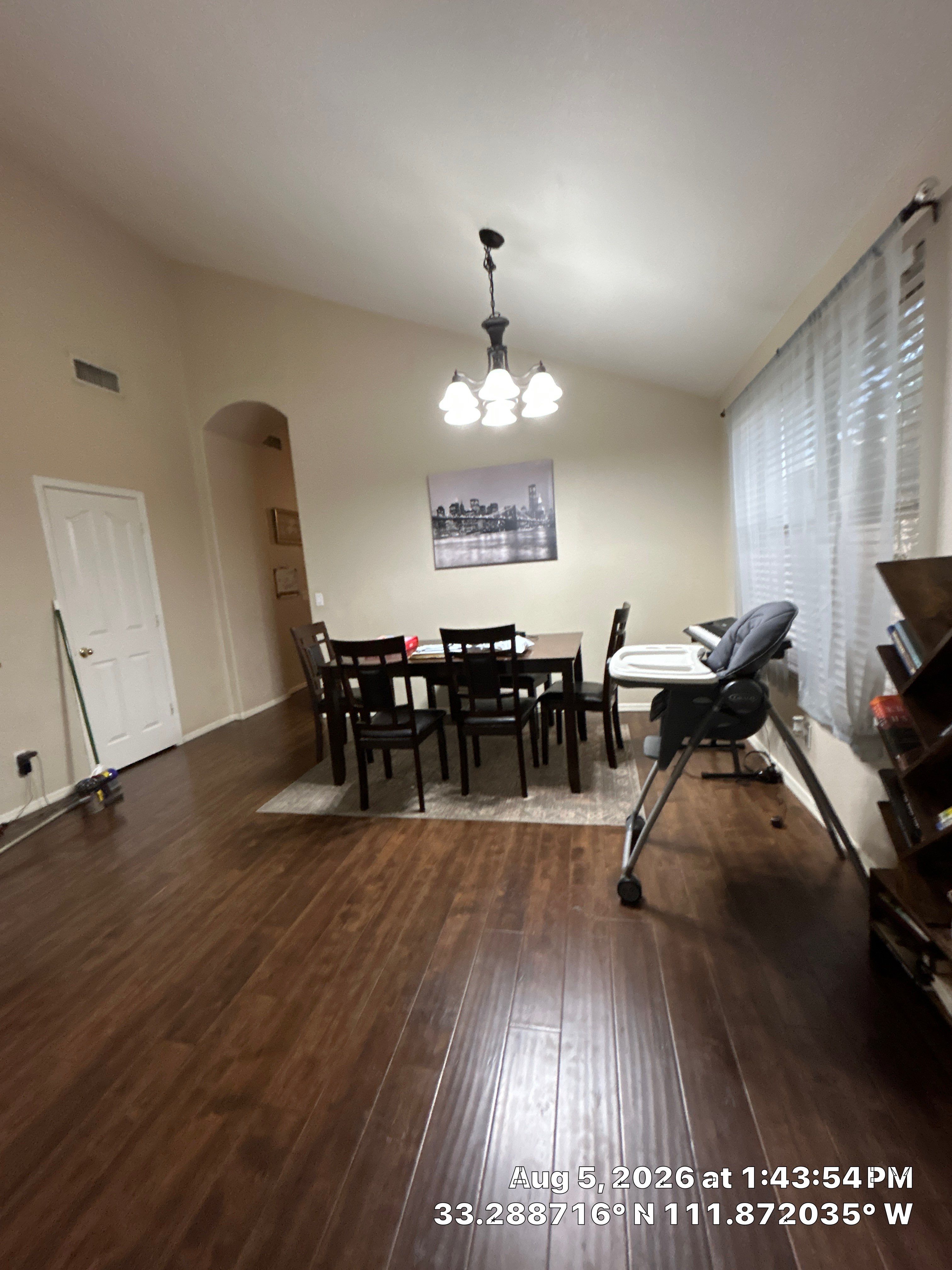 Chandler Dining Room Update with Dark Wood Laminate Flooring by CompanyCam Sales Demo