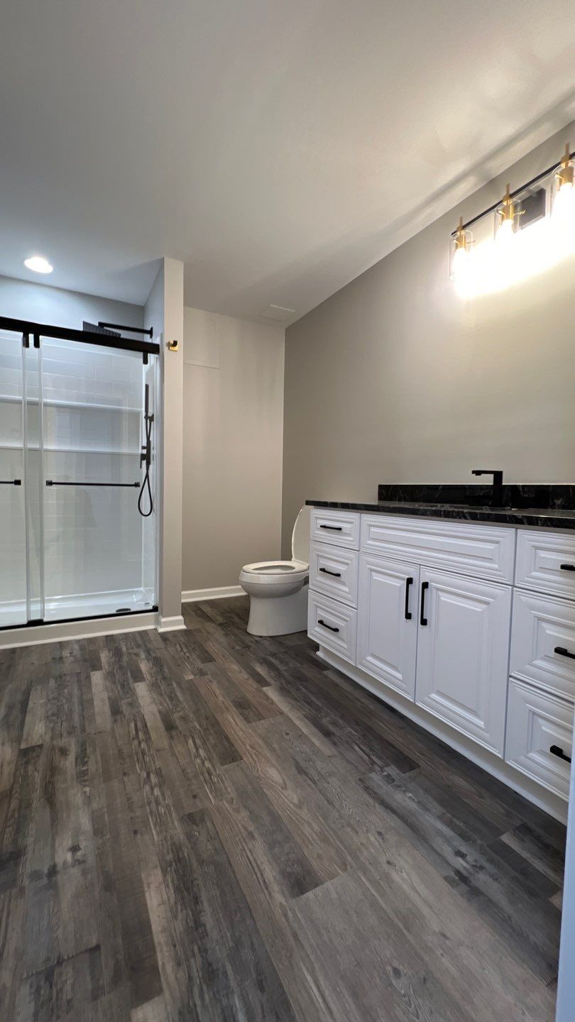Modern Basement Finishing Project in Acworth Featuring Custom Wet Bar by Swift Home Renovations
