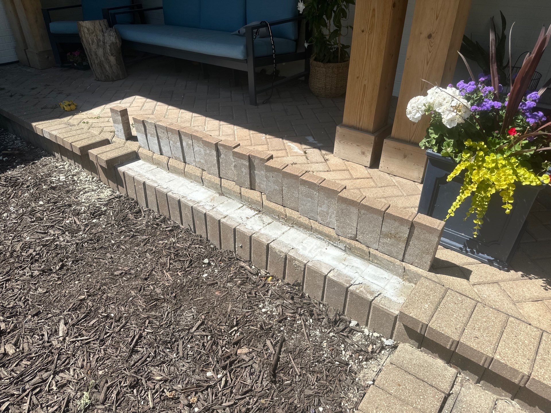Brick paver repair, cleaning and sealing by Northern Power Washing LLC.