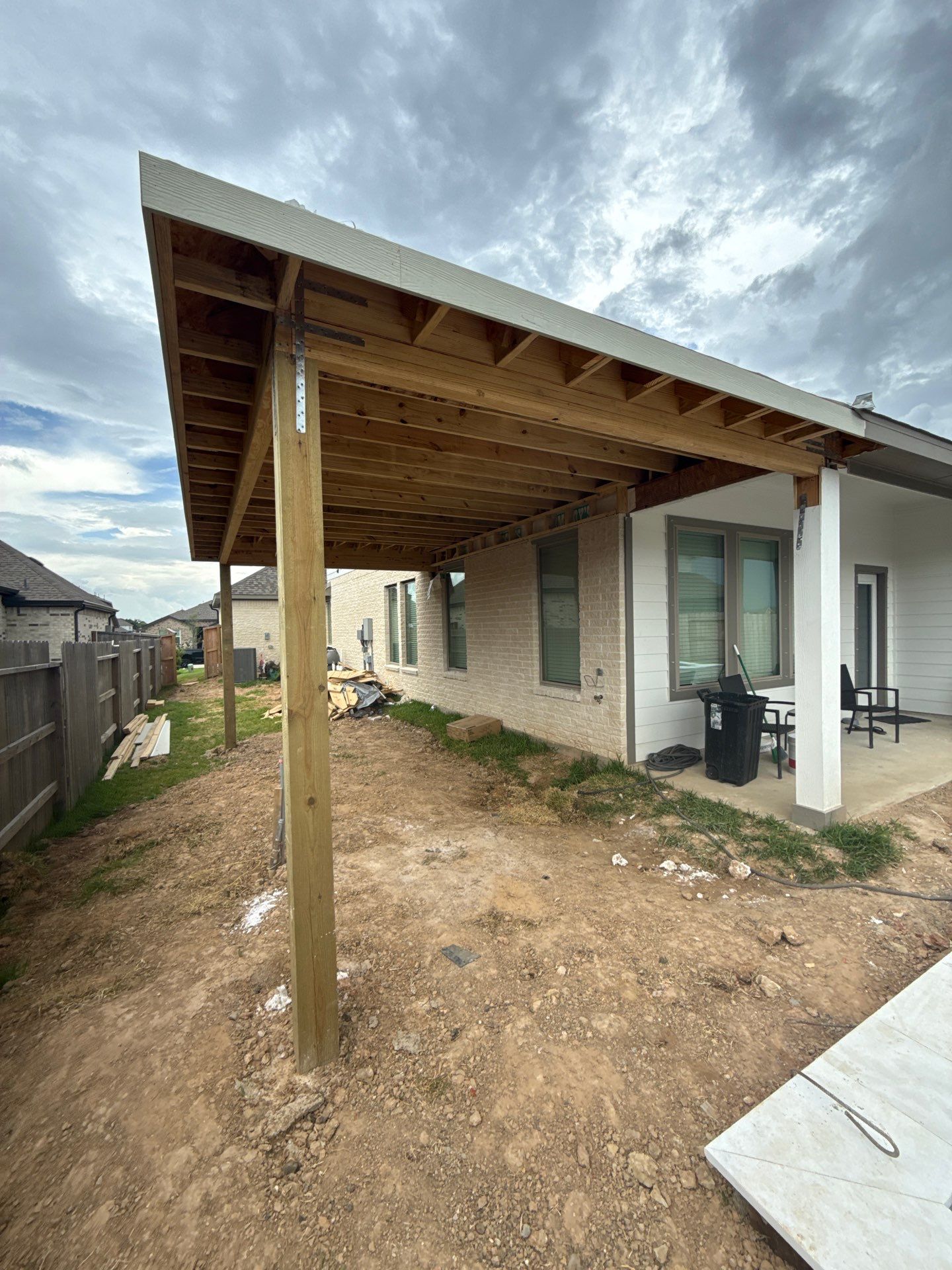 Patio and Summer Kitchen in Texas city by SophAlx LLC