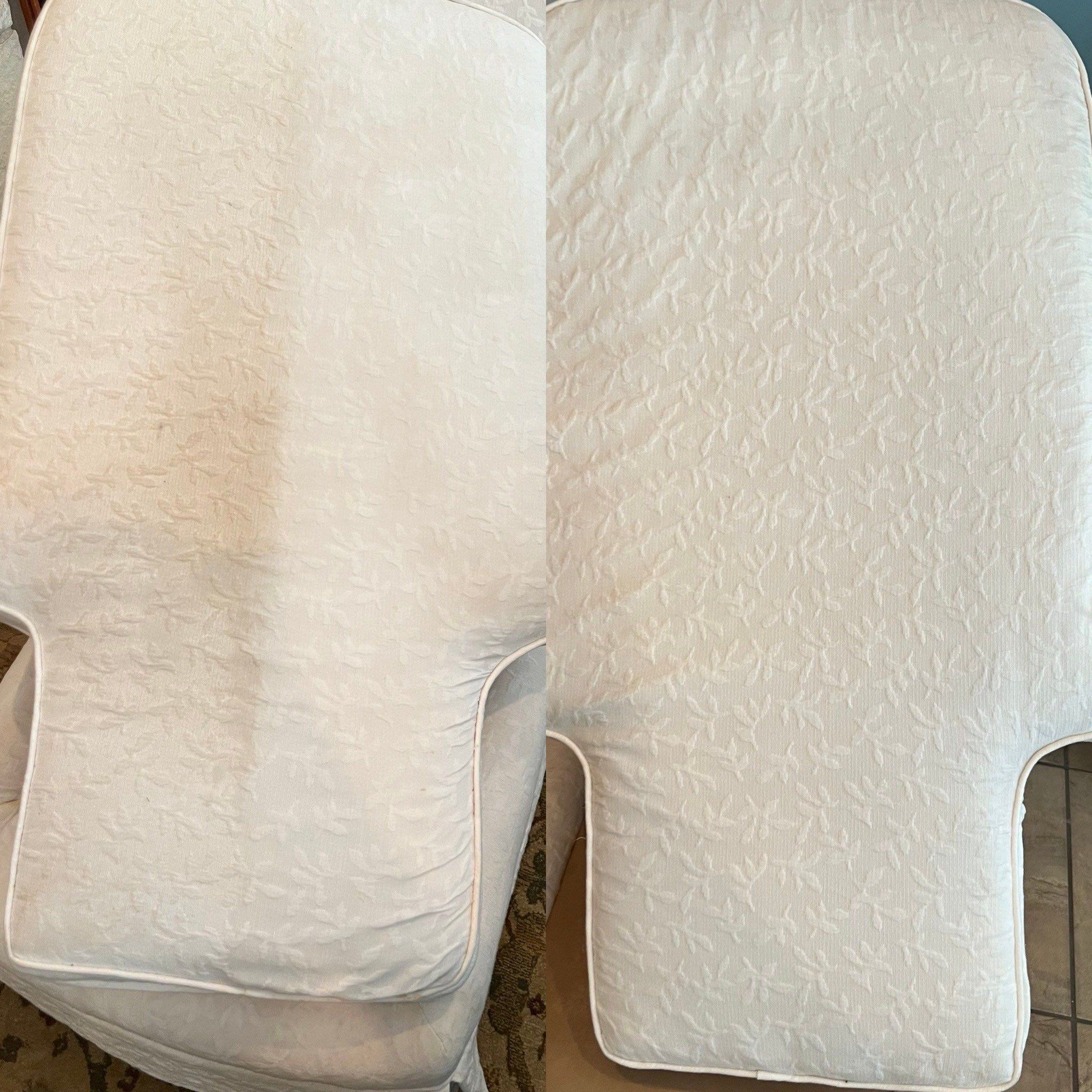 the service being done is upholstery cleaning on a light colored couch cushion showing a significant difference in cleanliness